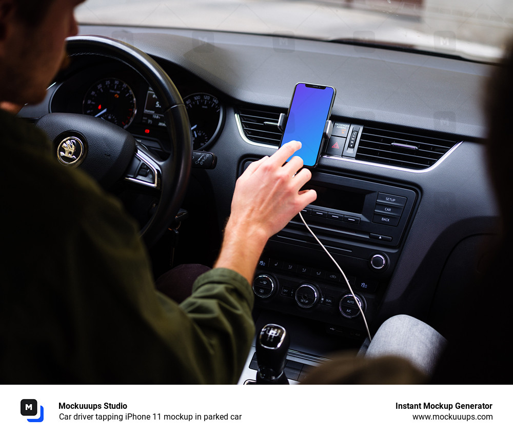 Car driver tapping iPhone 11 mockup in parked car