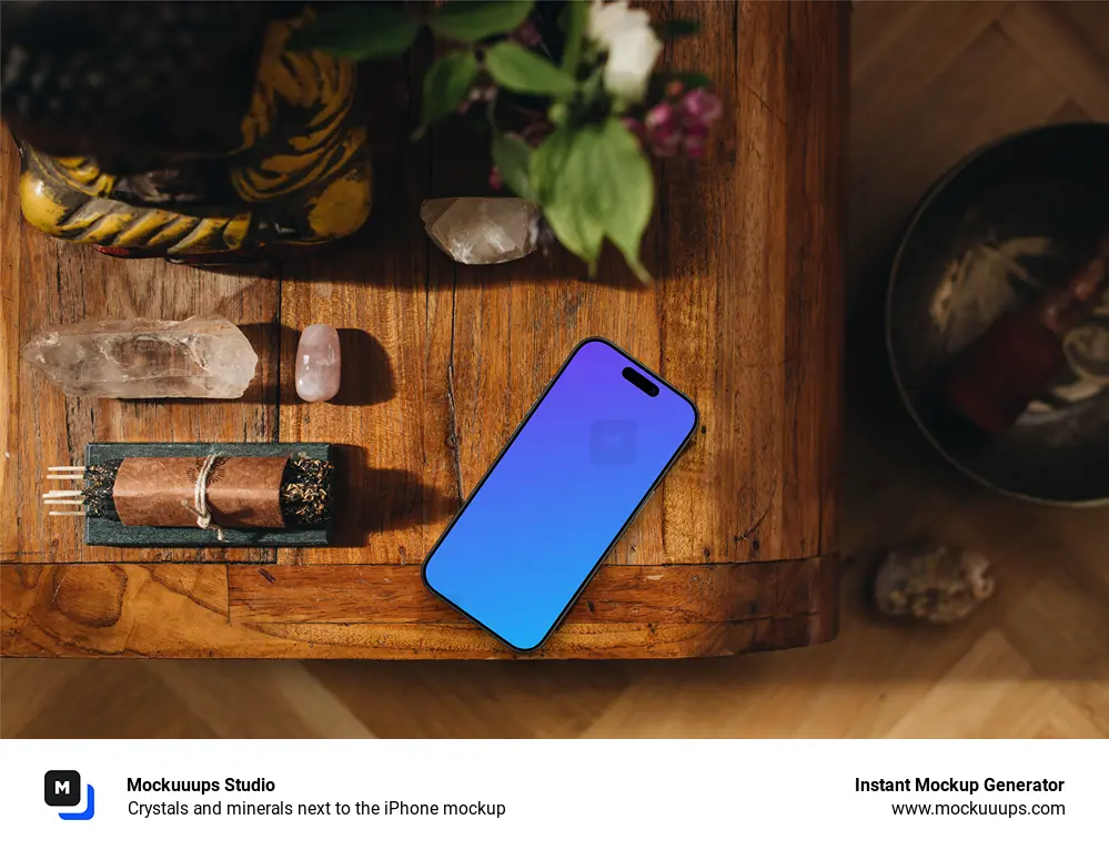 Crystals and minerals next to the iPhone mockup