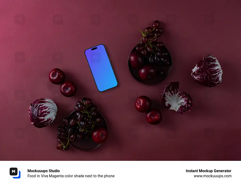 Food in Viva Magenta color shade next to the phone