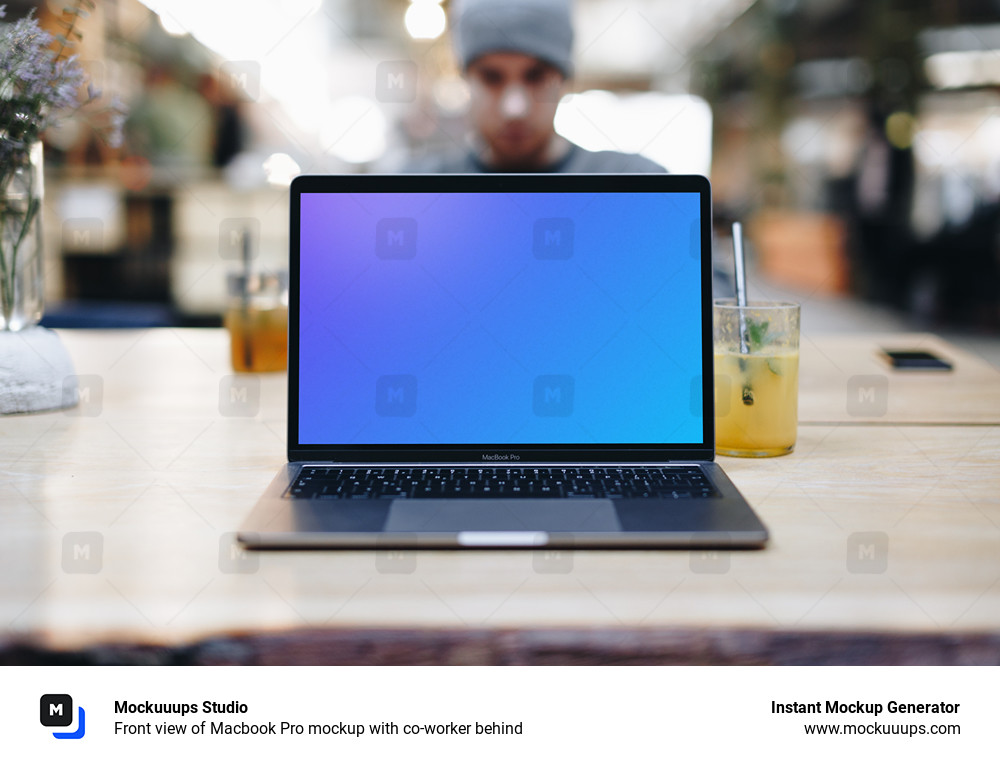 Front view of Macbook Pro mockup with co-worker behind