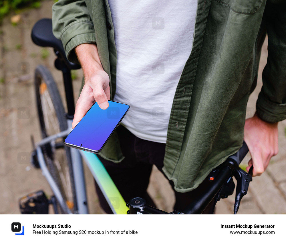 Free Holding Samsung S20 mockup in front of a bike