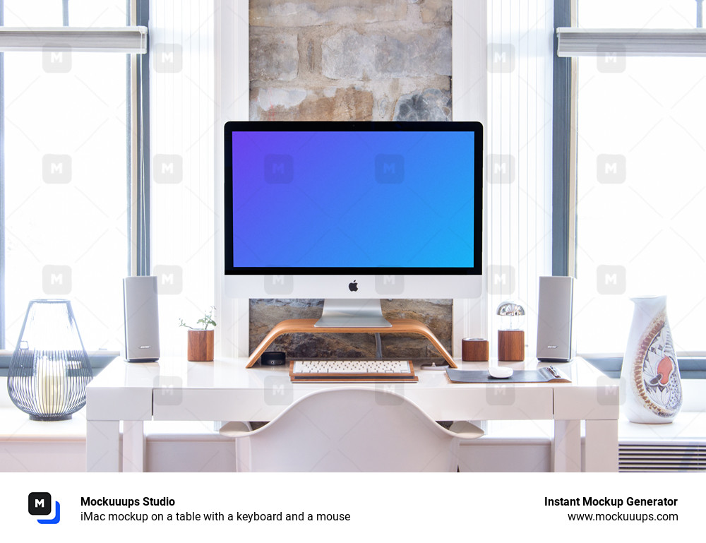 iMac mockup on a table with a keyboard and a mouse 