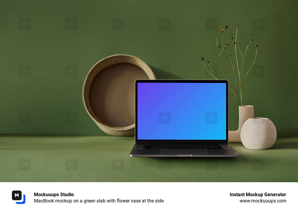 MacBook mockup on a green slab with flower vase at the side