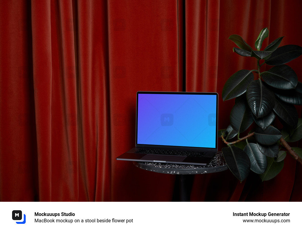 MacBook mockup on a stool beside flower pot