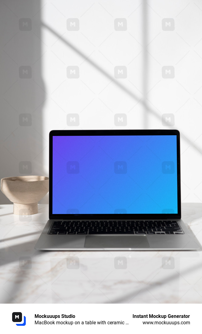 MacBook mockup on a table with ceramic bowl in the background