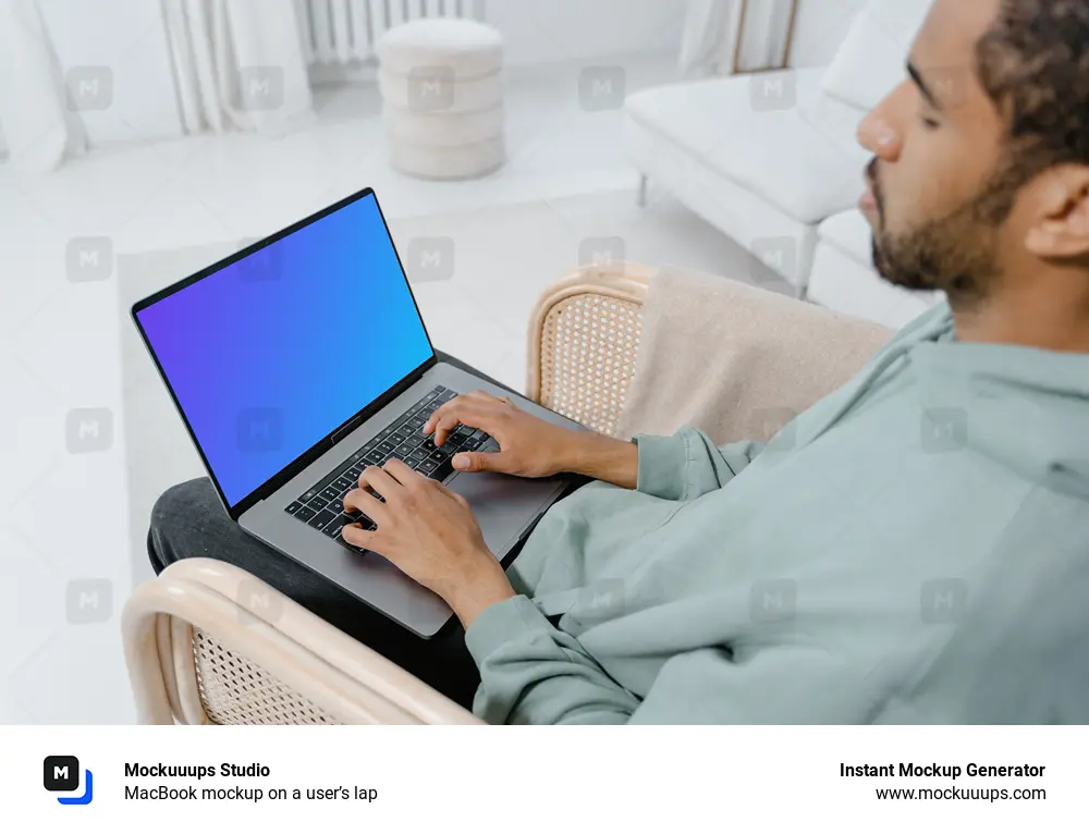 MacBook mockup on a user’s lap