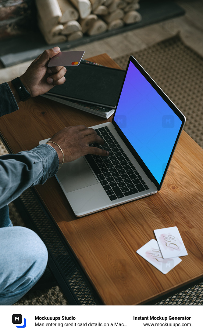 Man entering credit card details on a MacBook Pro mockup