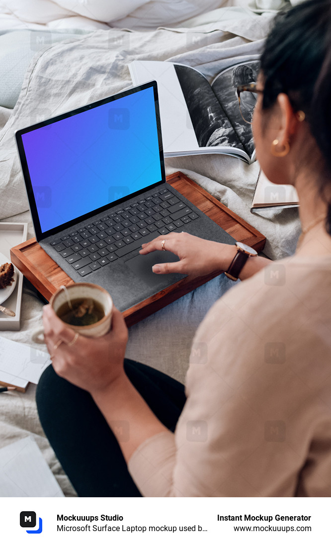 Microsoft Surface Laptop mockup used by a lady on a wooden slab
