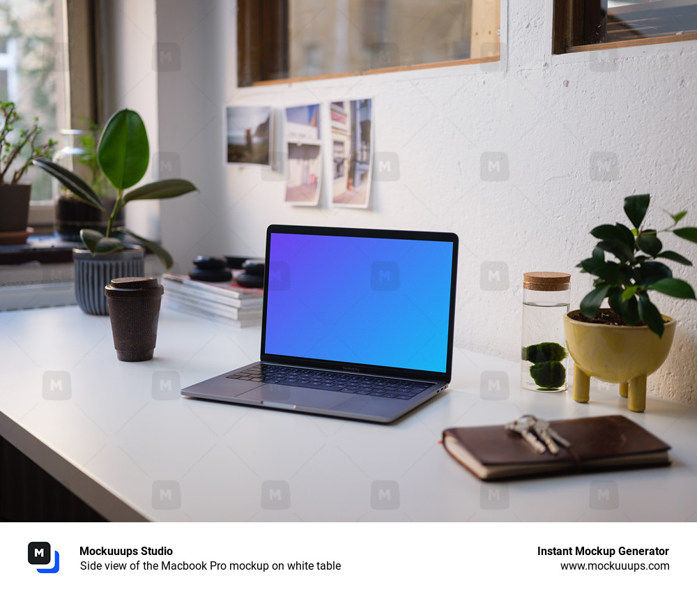 Side view of the Macbook Pro mockup on white table