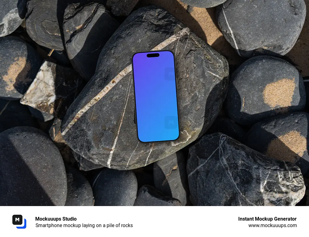 Smartphone mockup laying on a pile of rocks