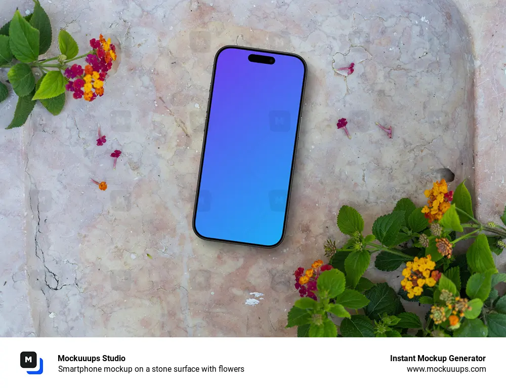 Smartphone mockup on a stone surface with flowers