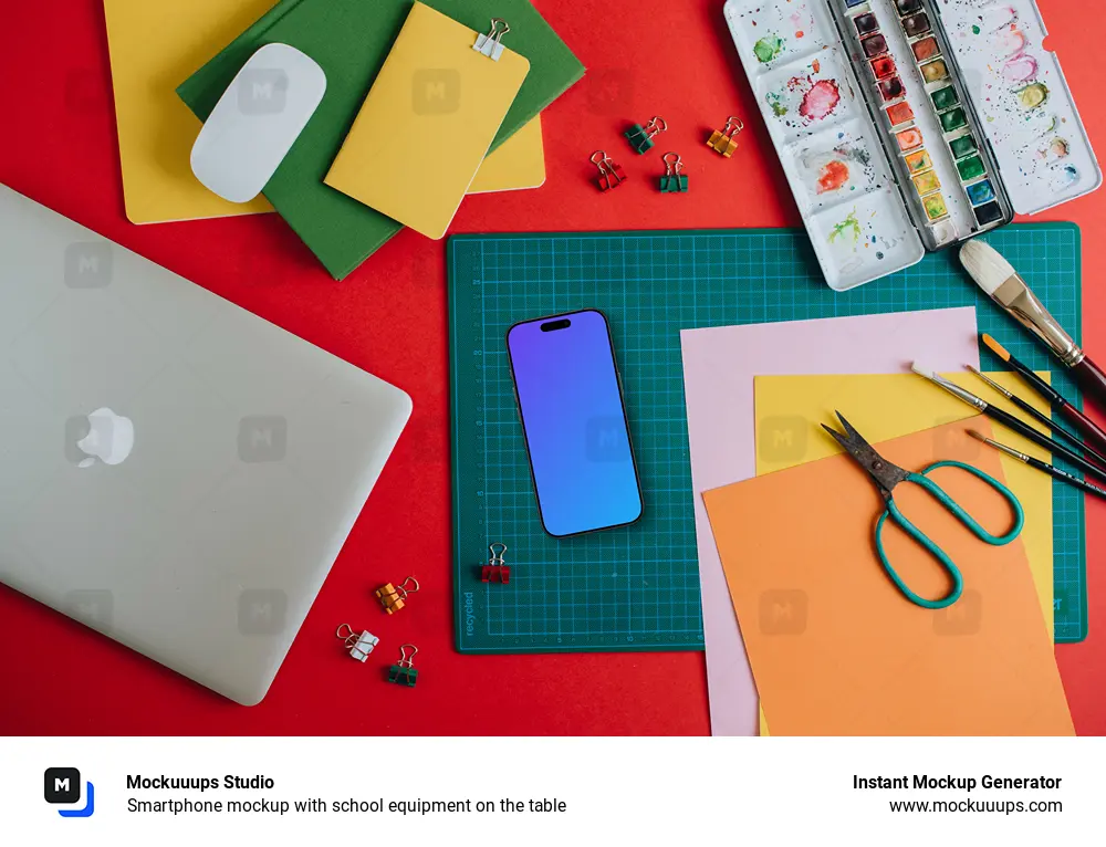 Smartphone mockup with school equipment on the table