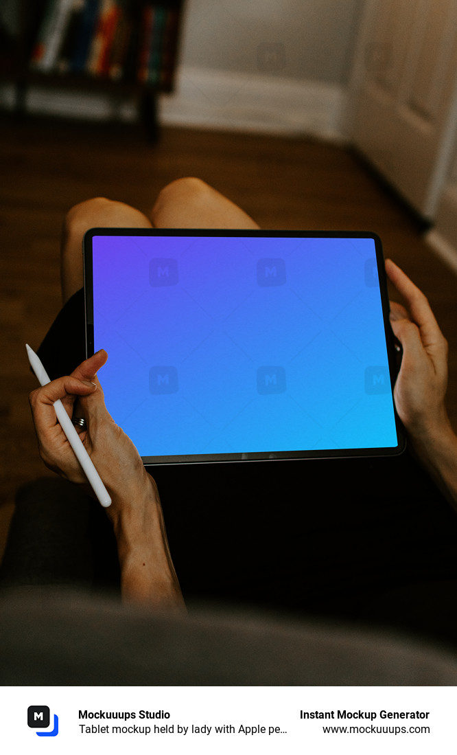 Tablet mockup held by lady with Apple pencil