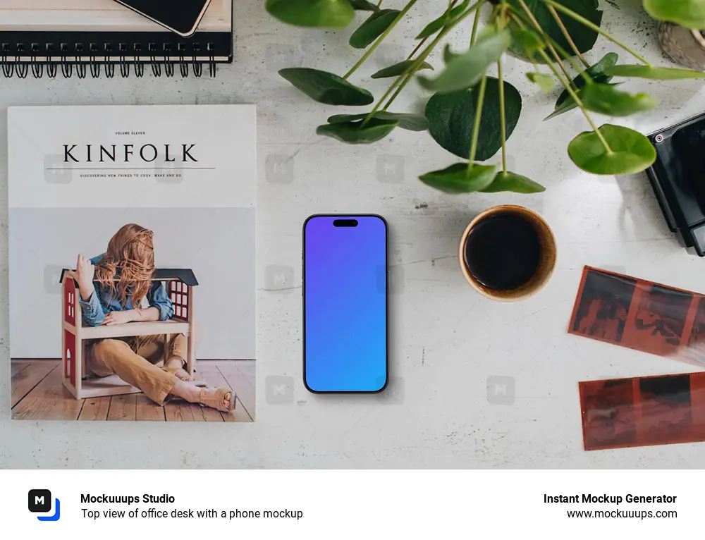 Top view of office desk with a phone mockup