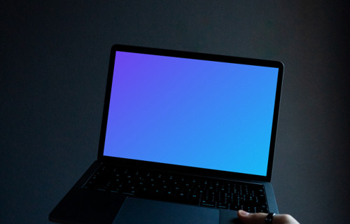 MacBook mockup in the dark environment