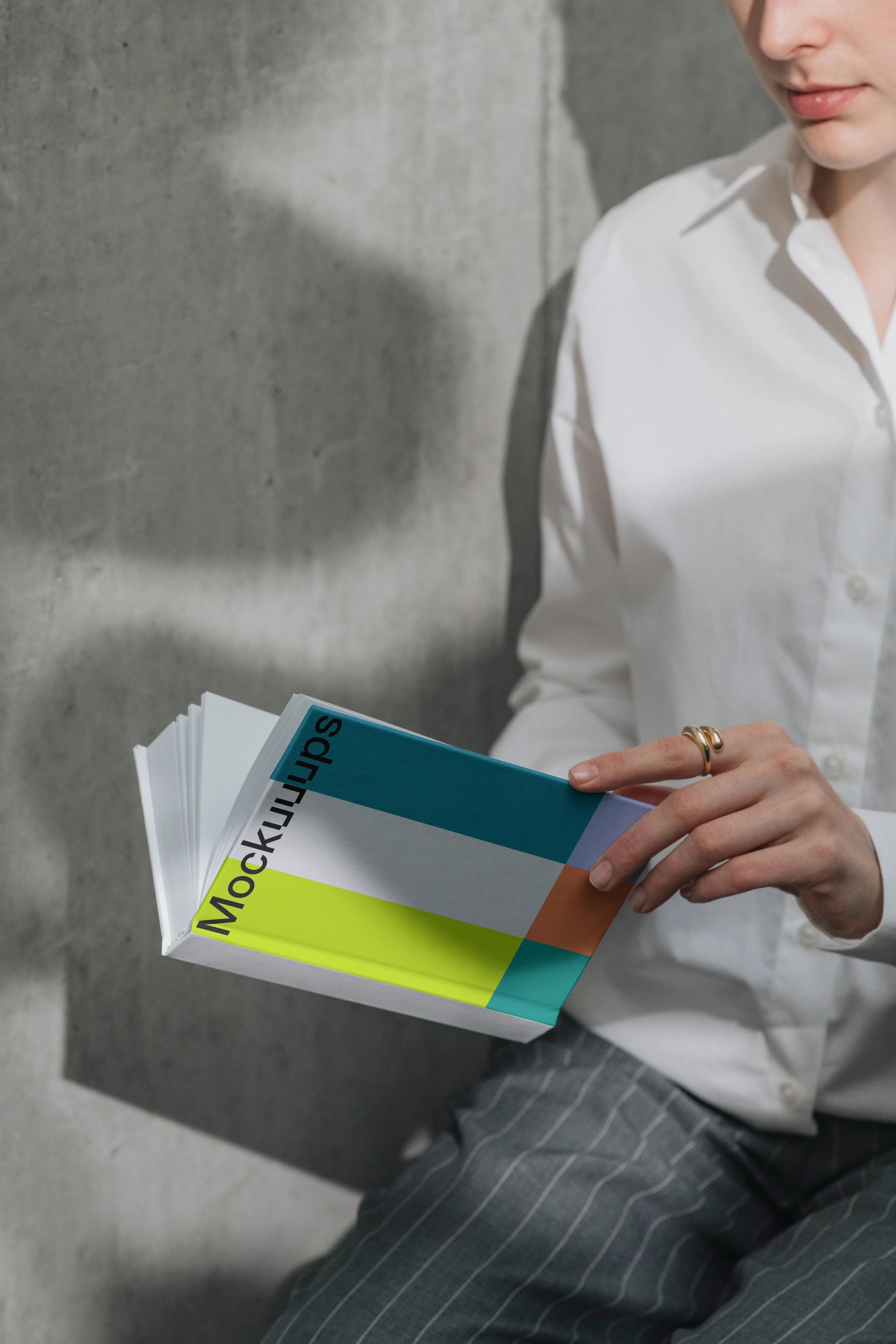 A-format book mockup in a casual setting