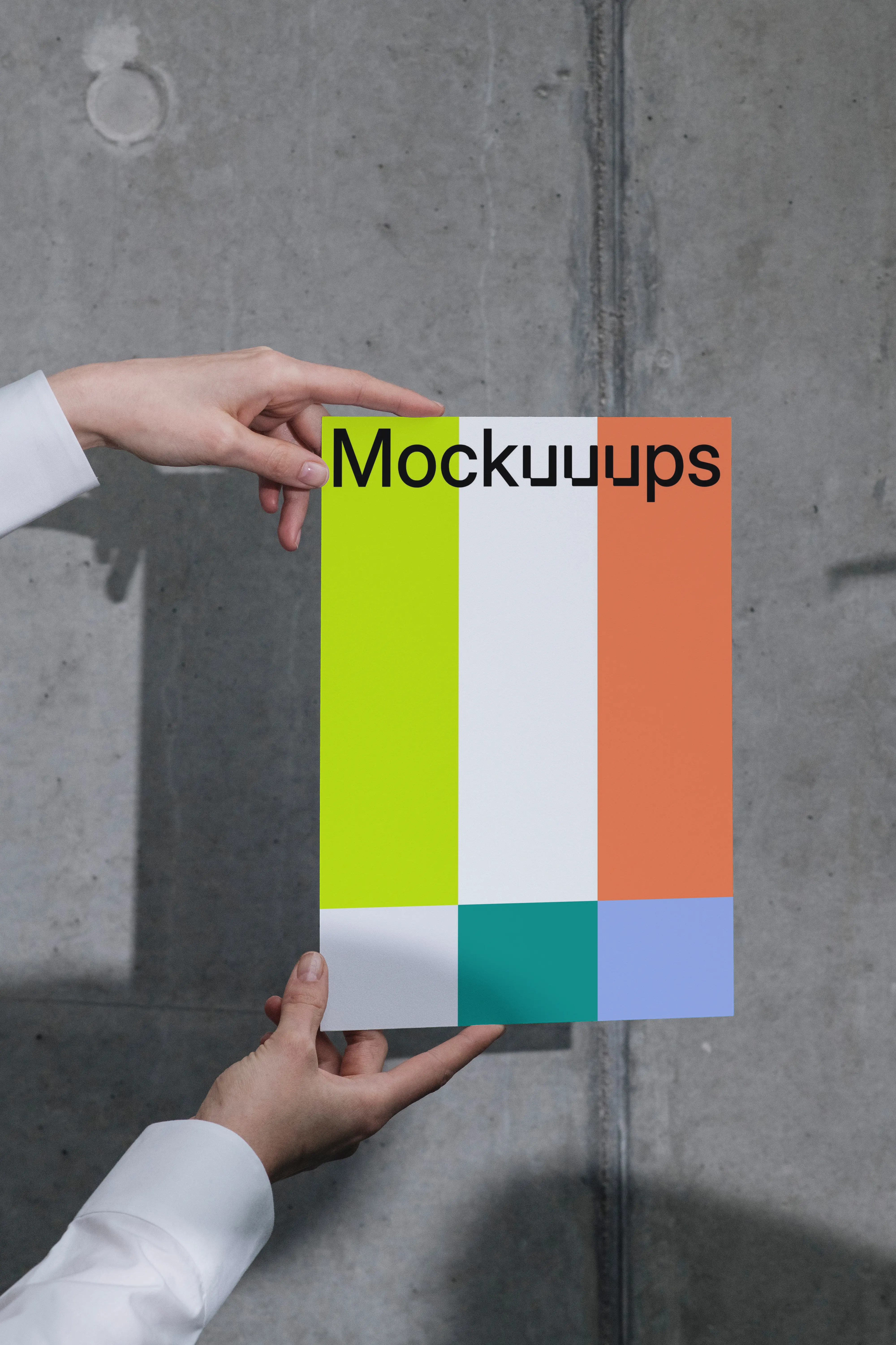 A4 paper mockup held against a concrete wall