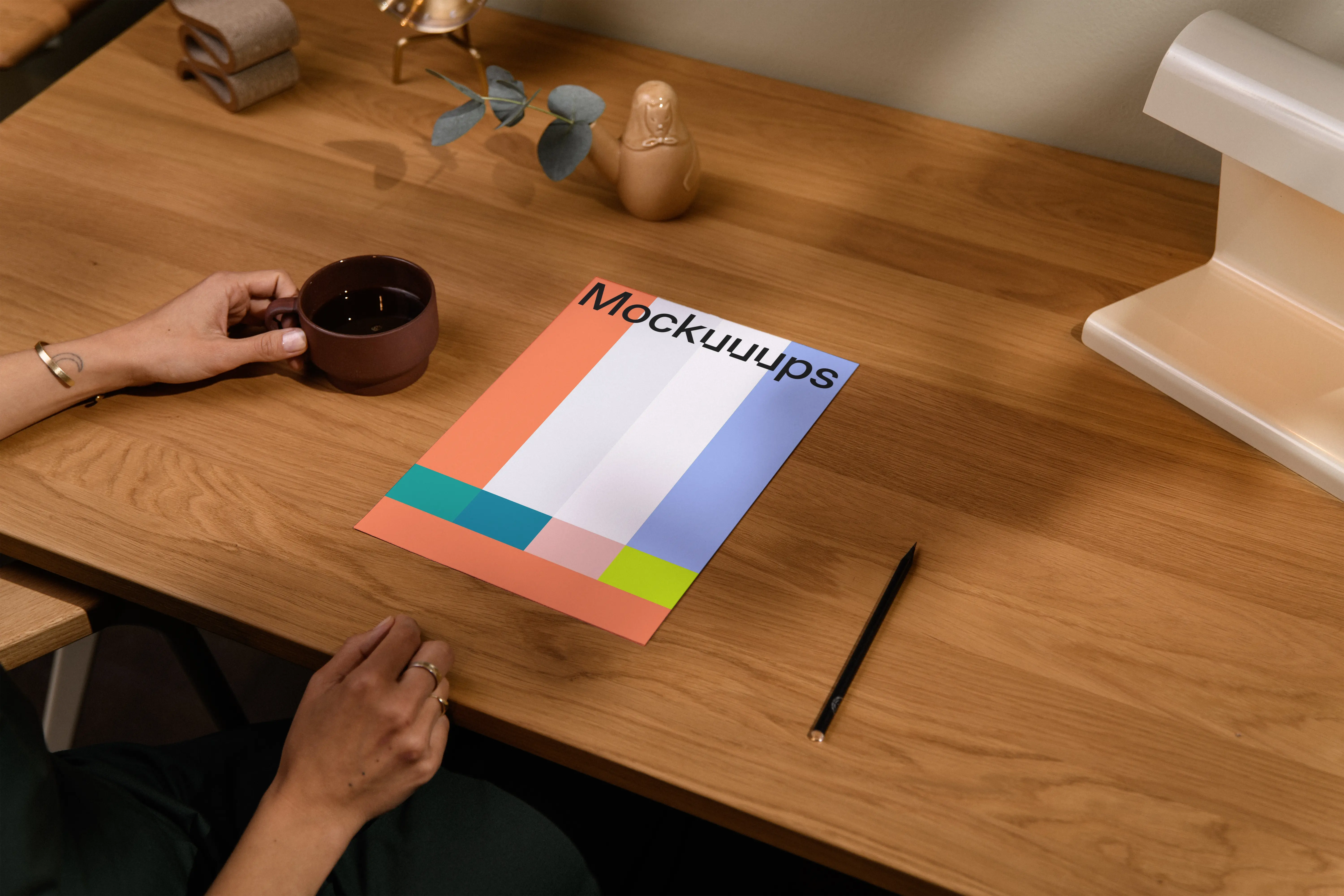 A4 paper mockup on a wooden desk