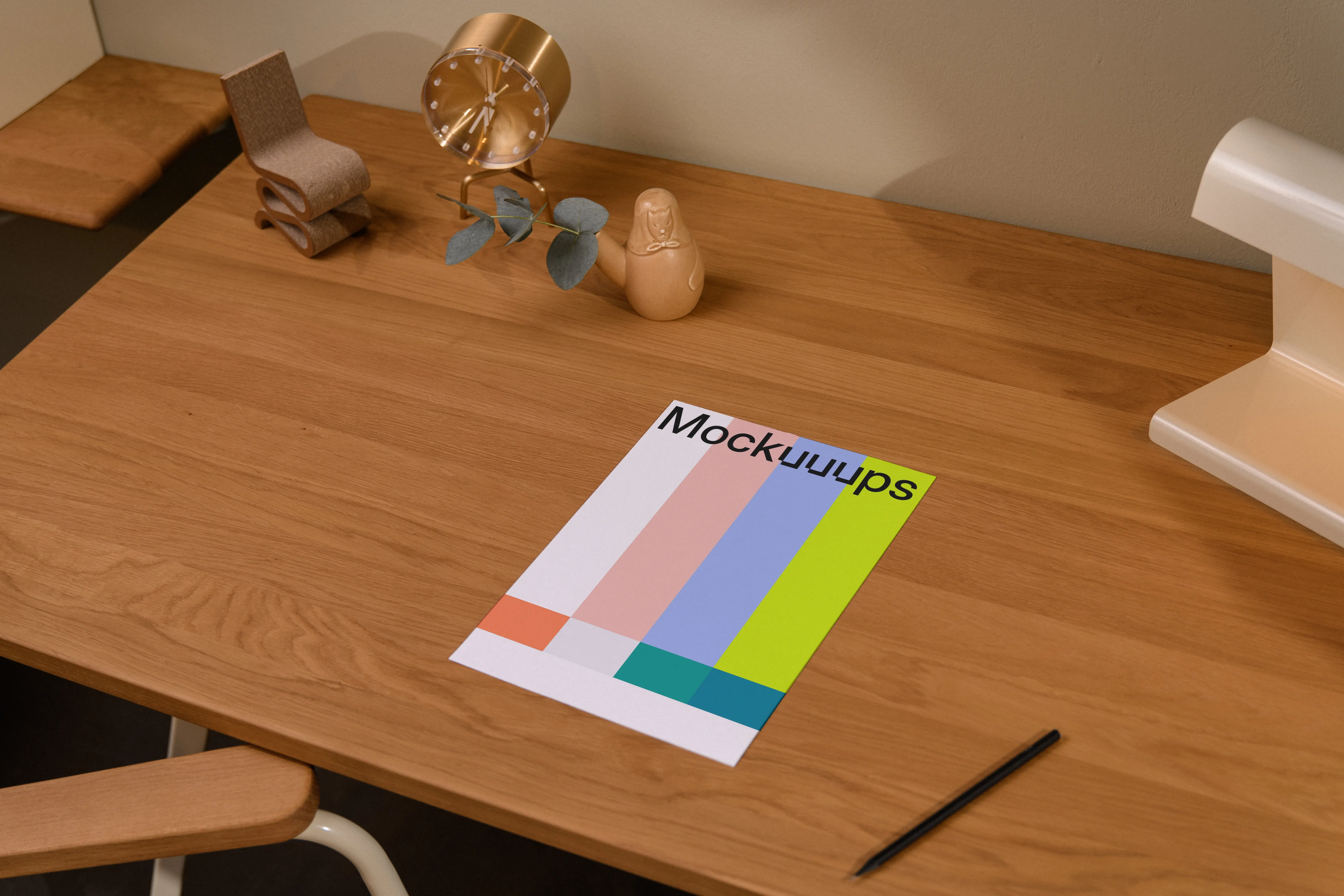 A4 paper mockup on a wooden desk with decor