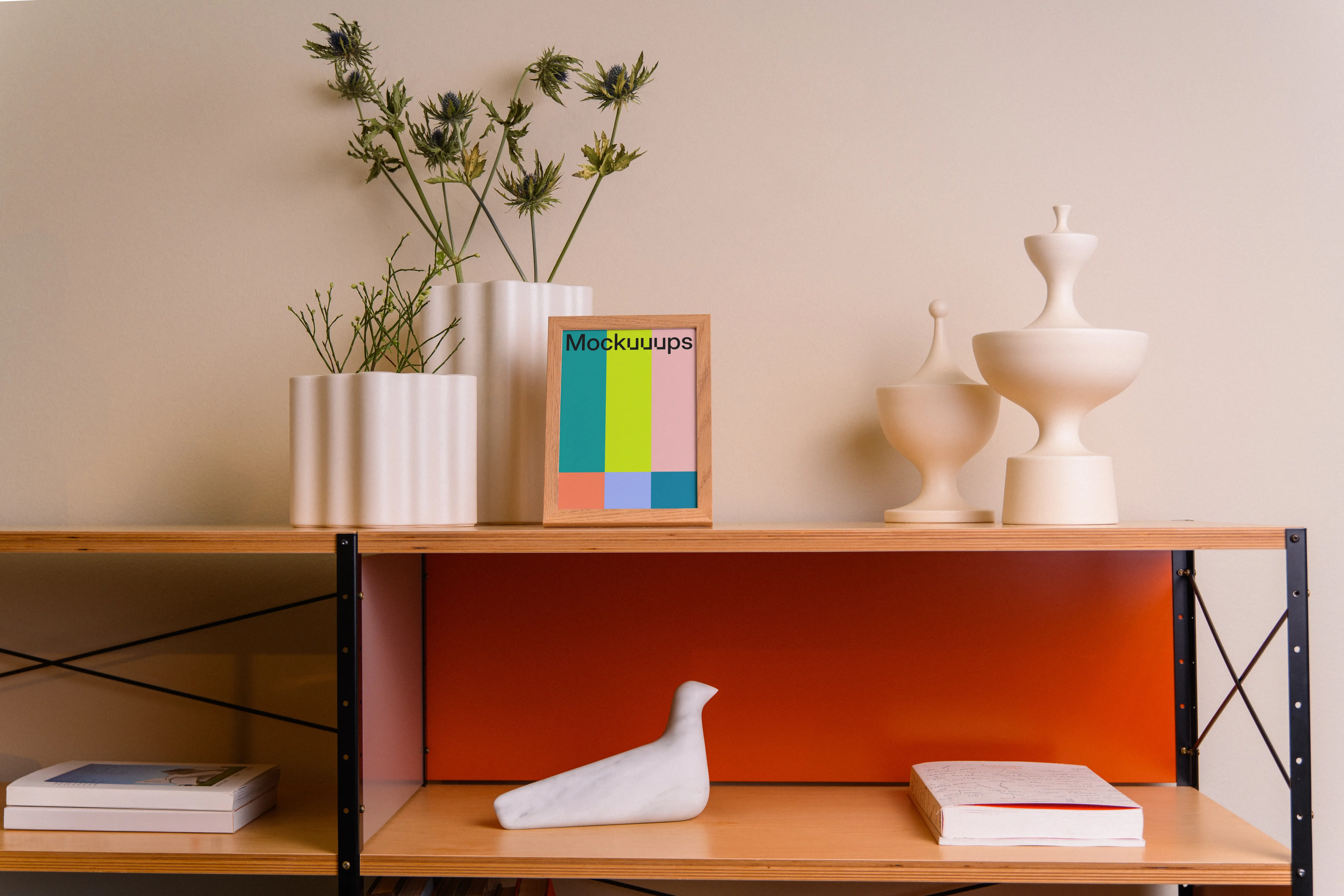 A5 mockup on a wooden shelf with decor