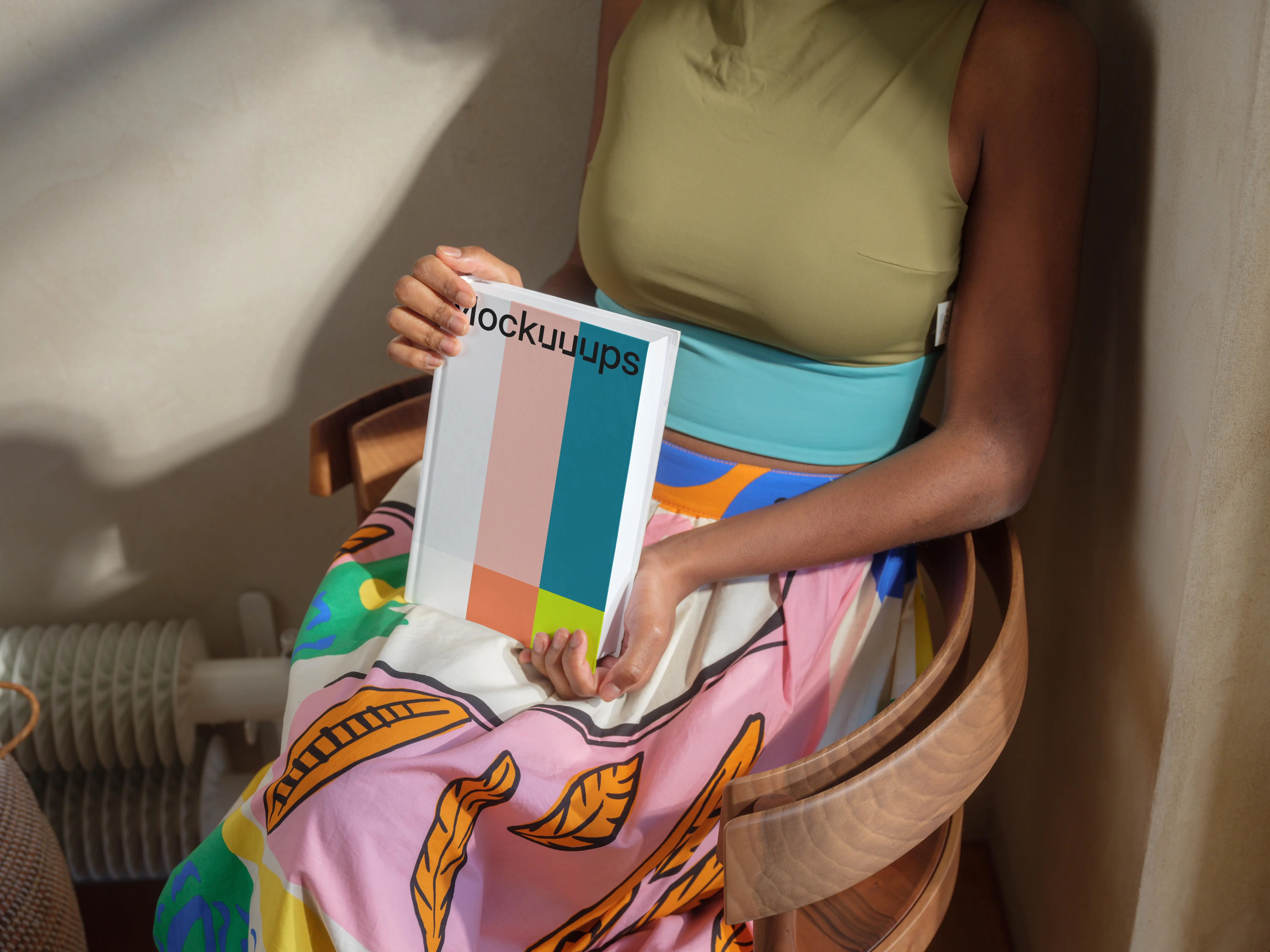 Book mockup in a cozy indoor setting