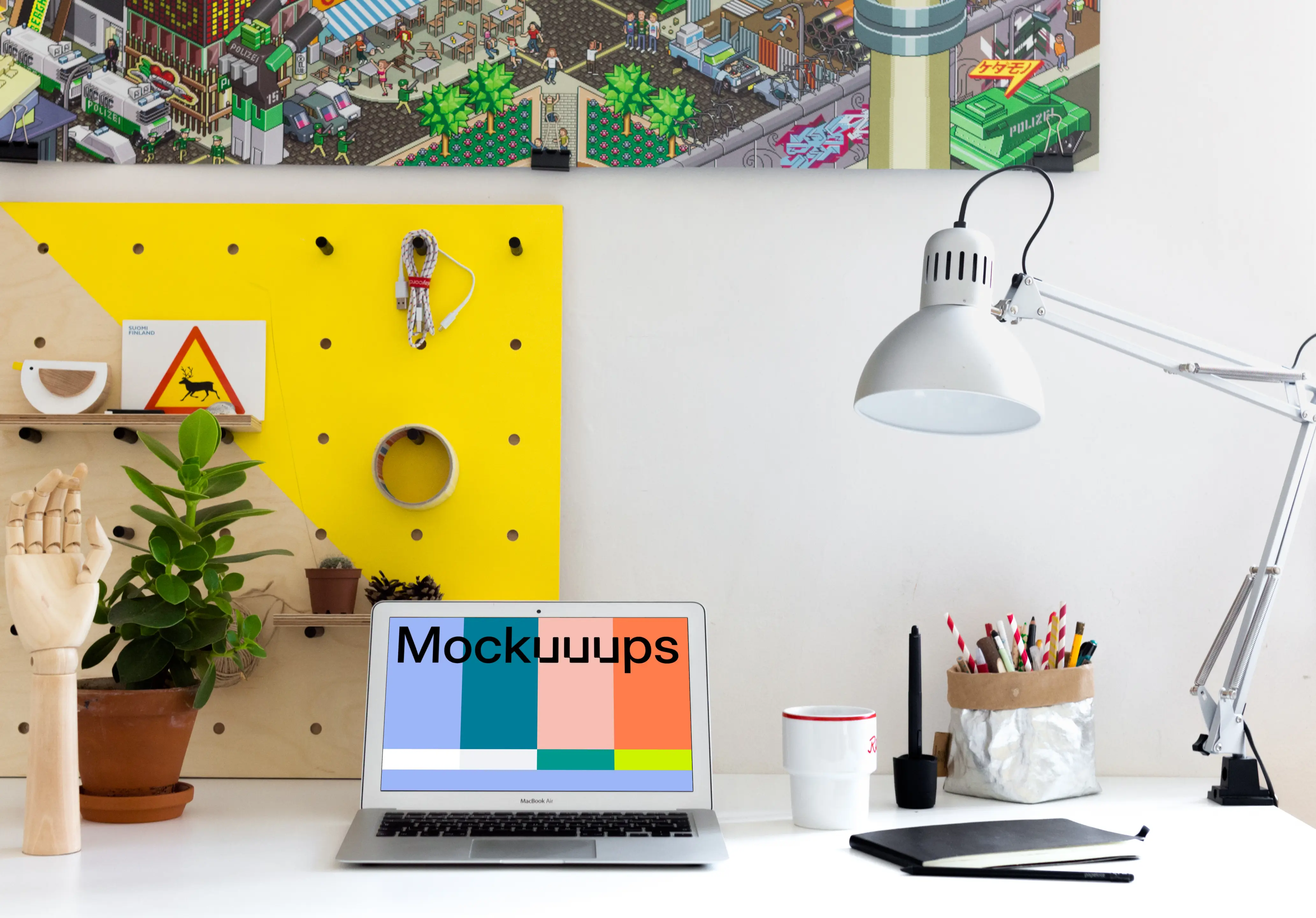 Bright office environment mockup with MacBook Air