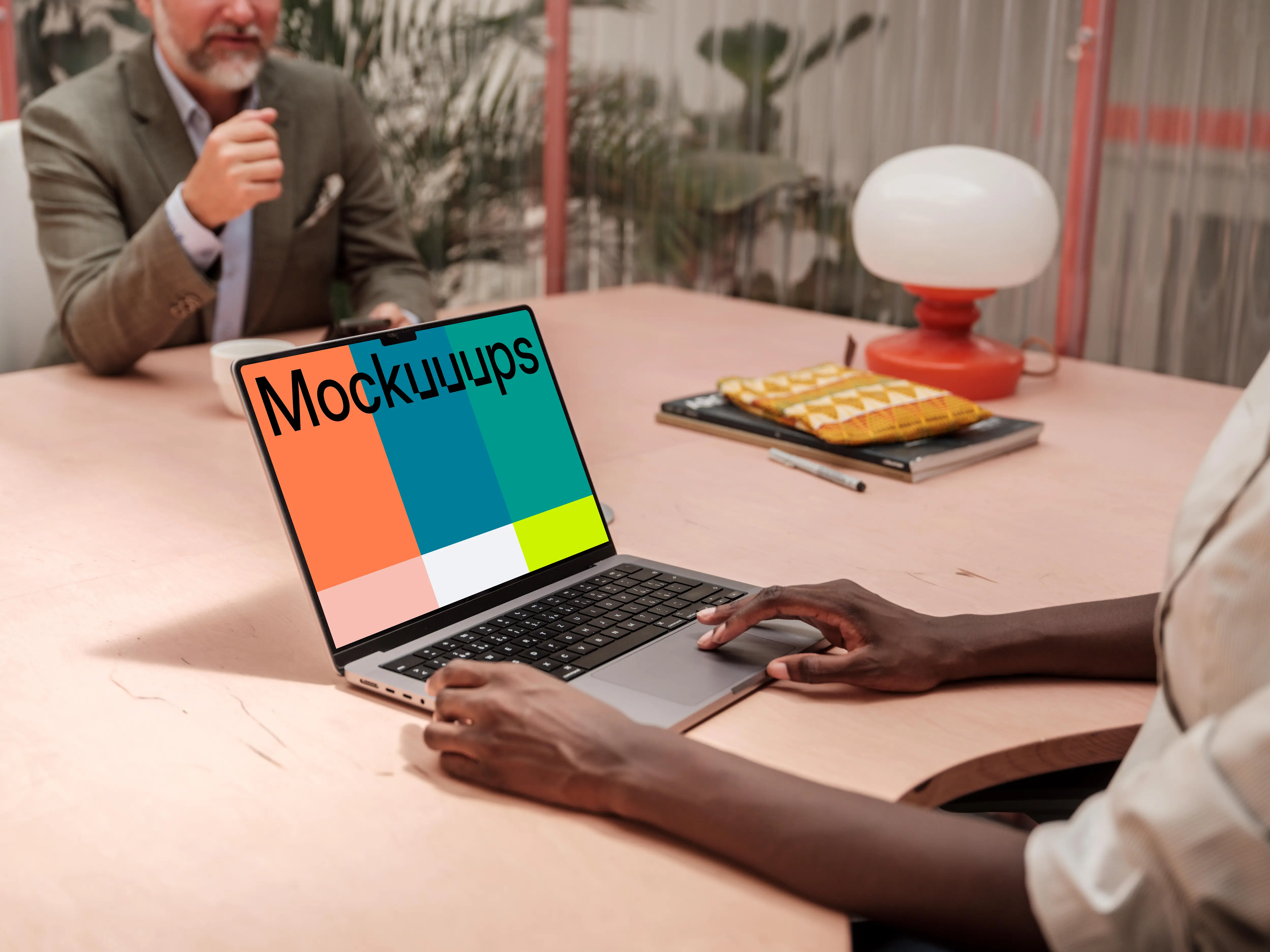 Business meeting with MacBook Pro 14 mockup