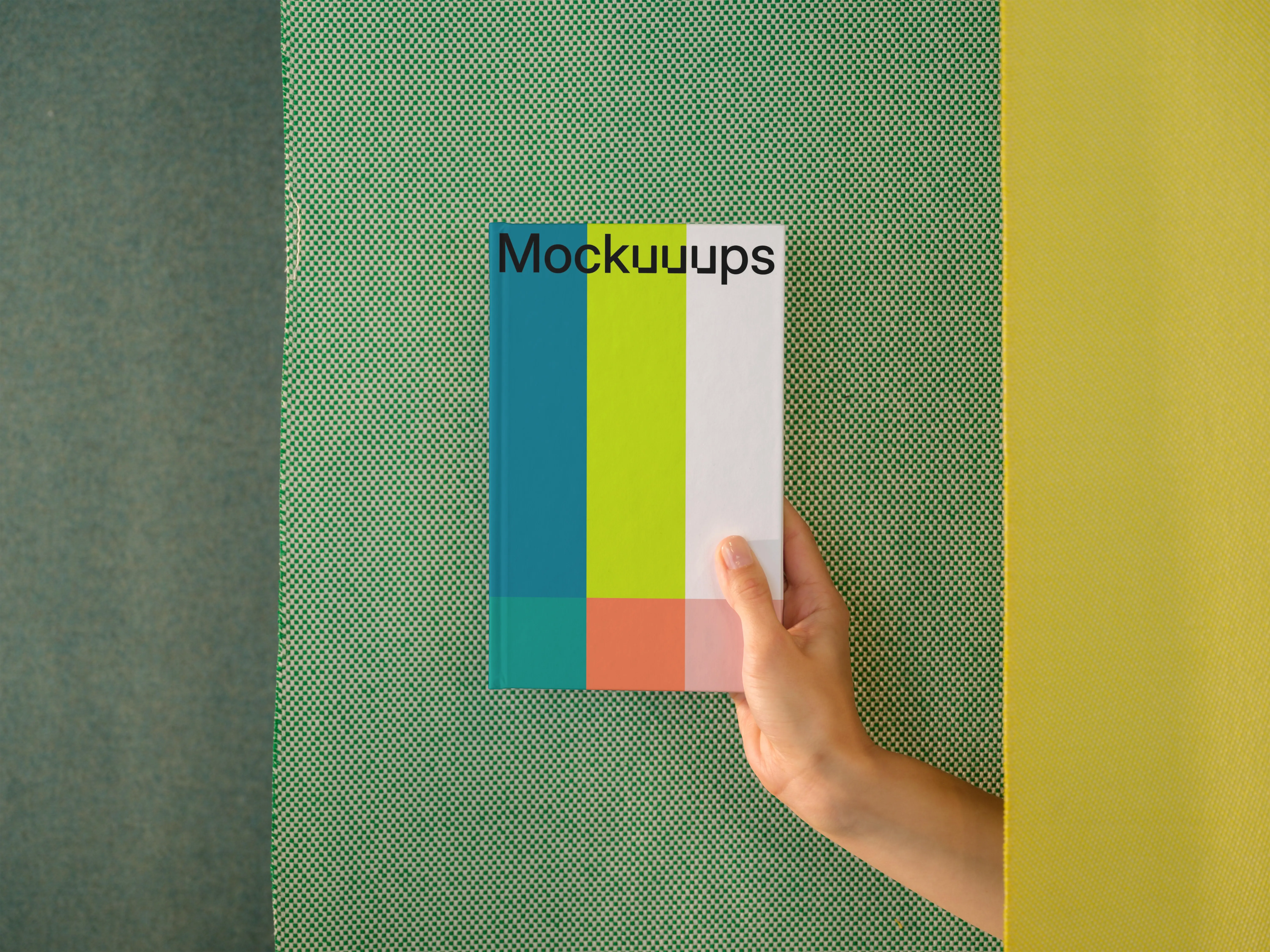 C-format book mockup with geometric background