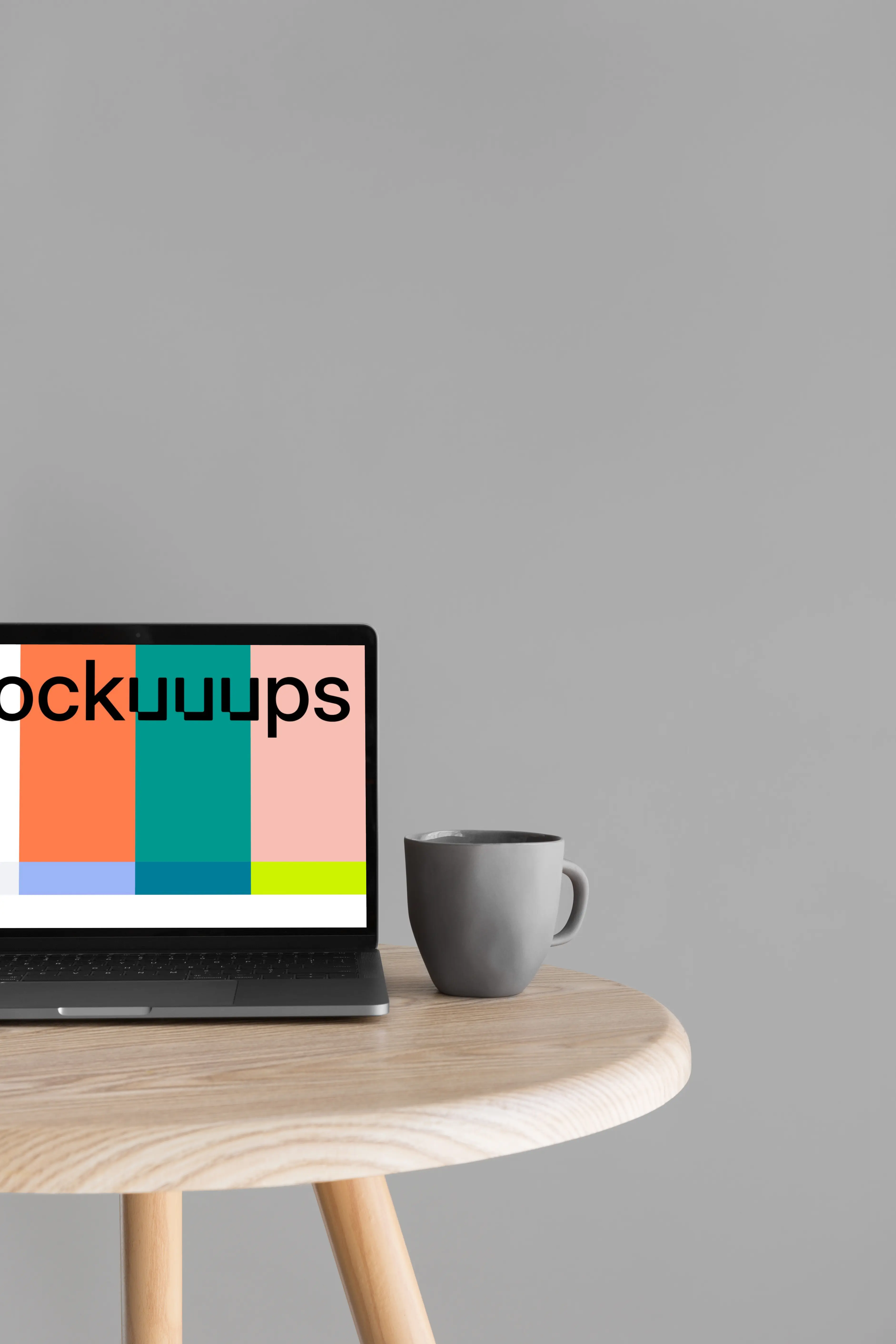 Cropped view of Macbook Pro mockup on wooden table