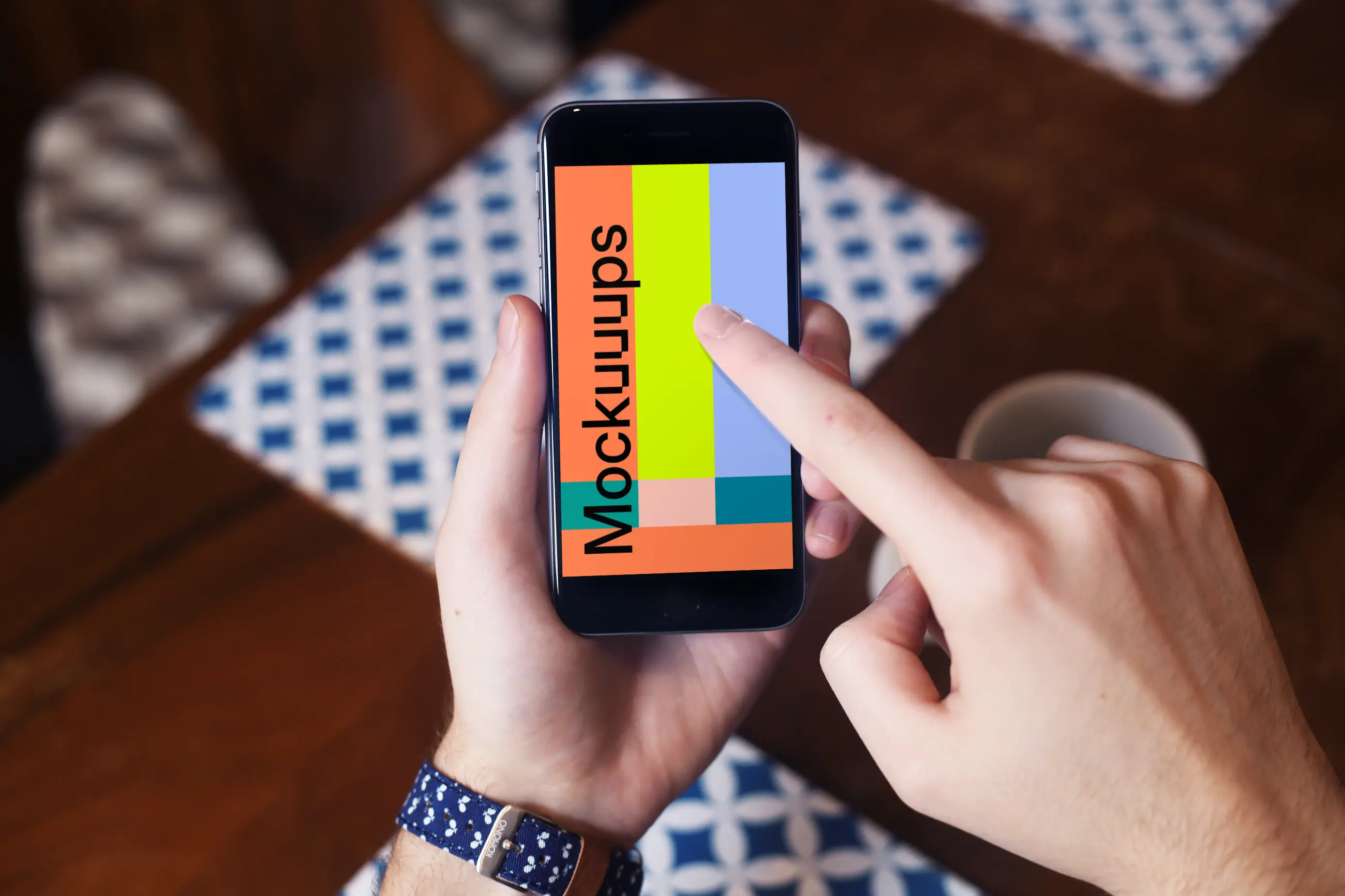 Drinking coffee and pointing on iPhone 6 mockup