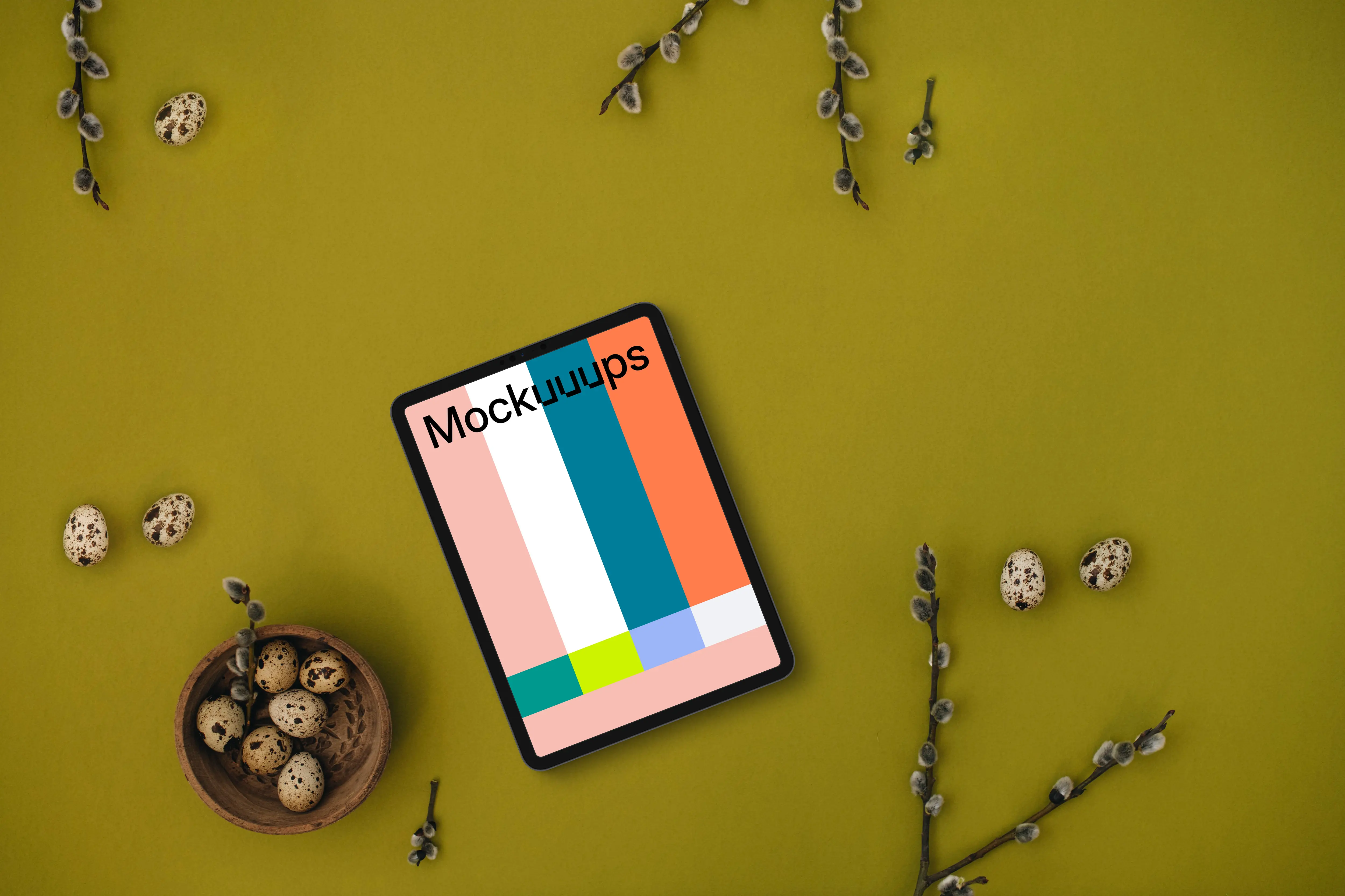 Easter Tablet mockup with furry catkins and quail eggs