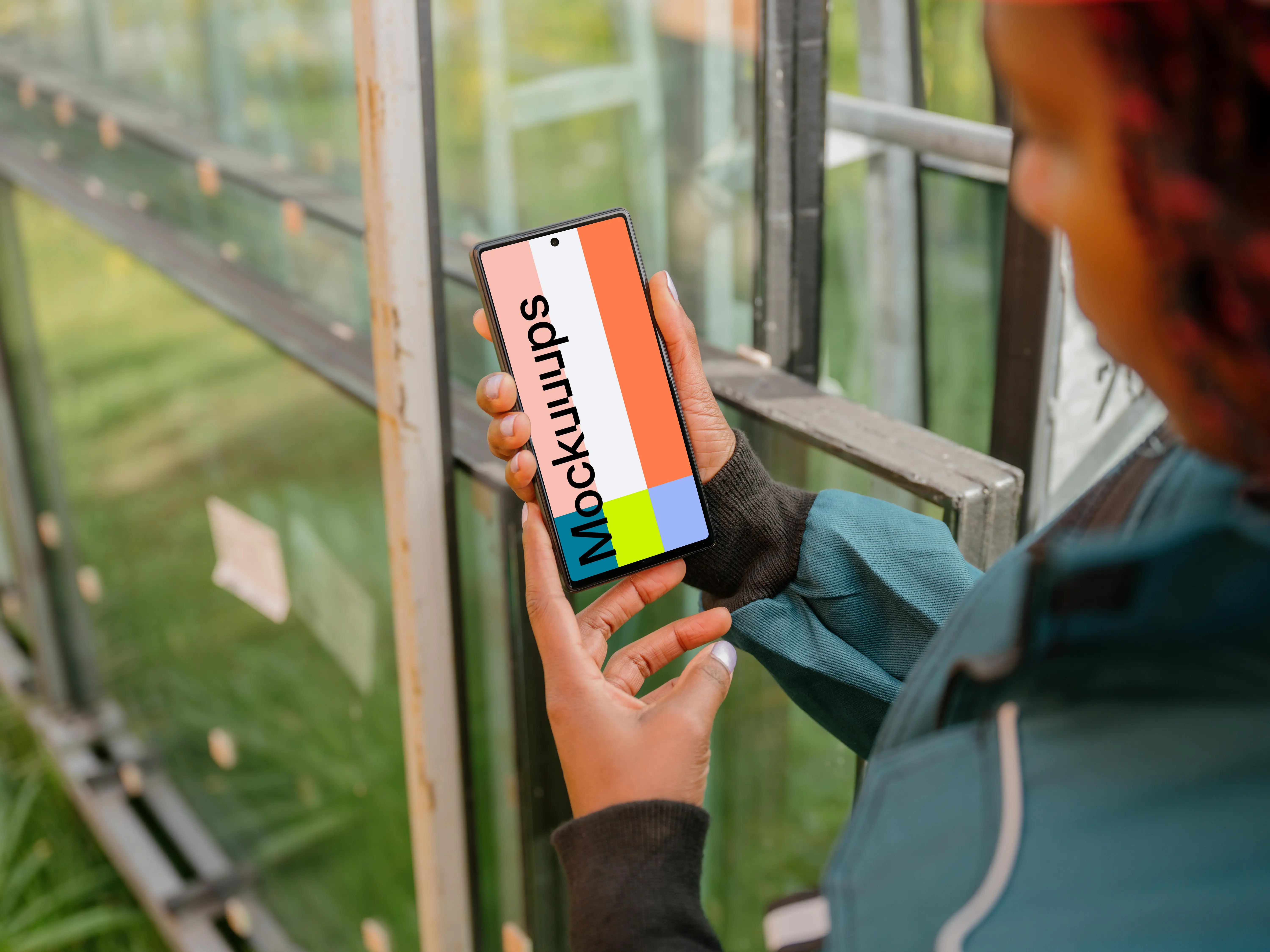 Female construction worker holding a Google Pixel mockup