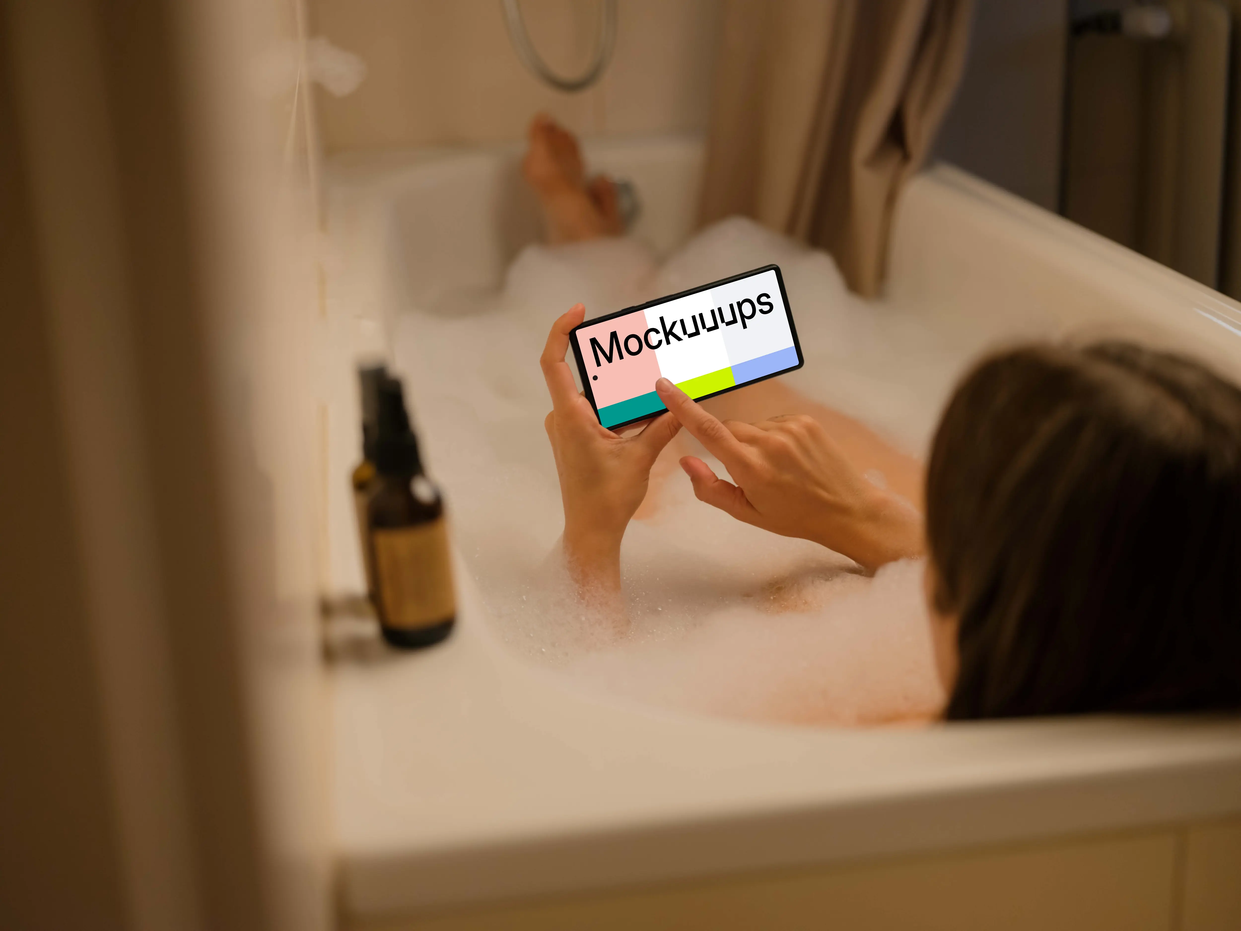 Female in bath typing on a Google Pixel mockup