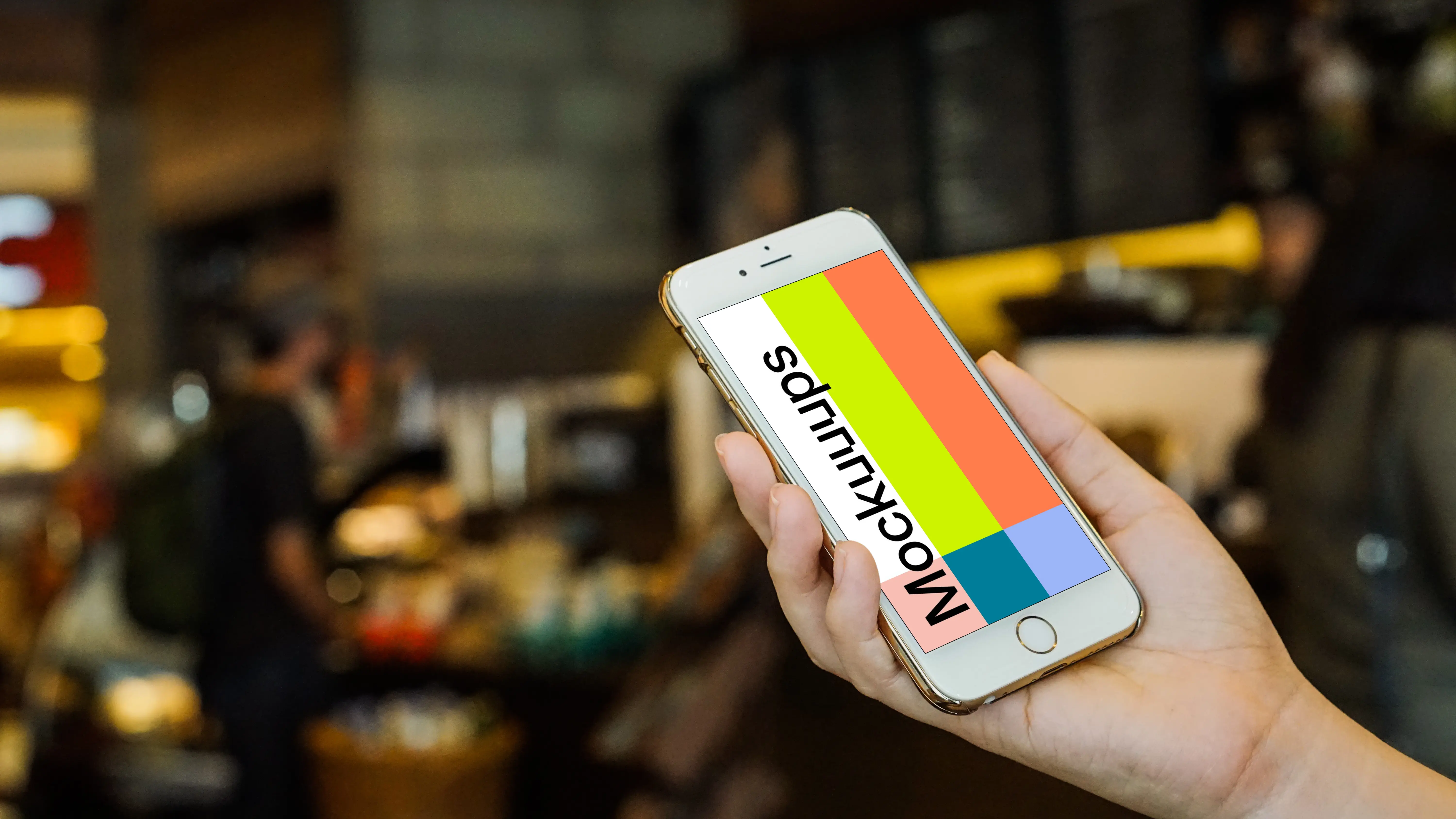 Holding iPhone 6 Gold mockup