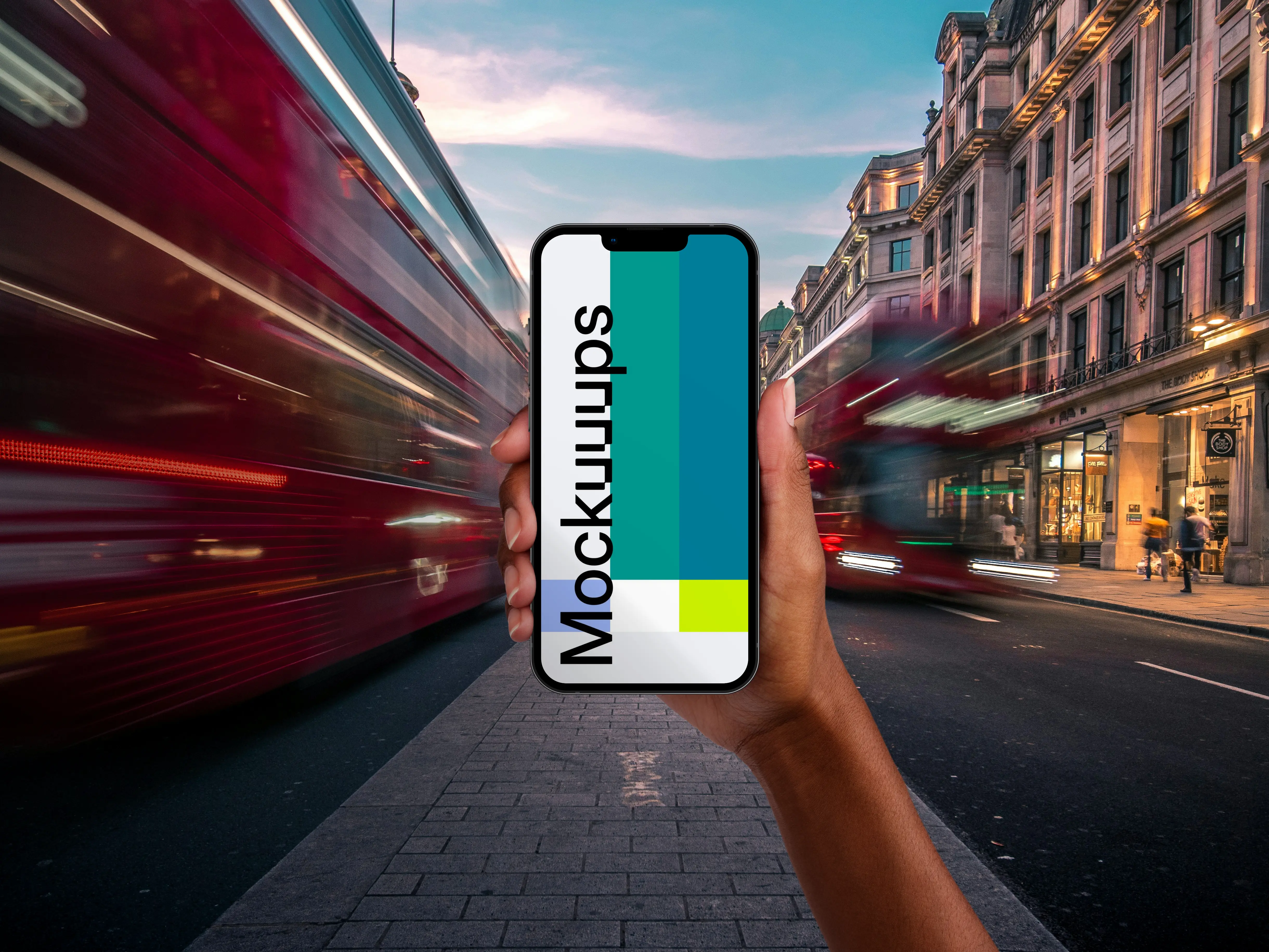 Holding smartphone mockup on the street