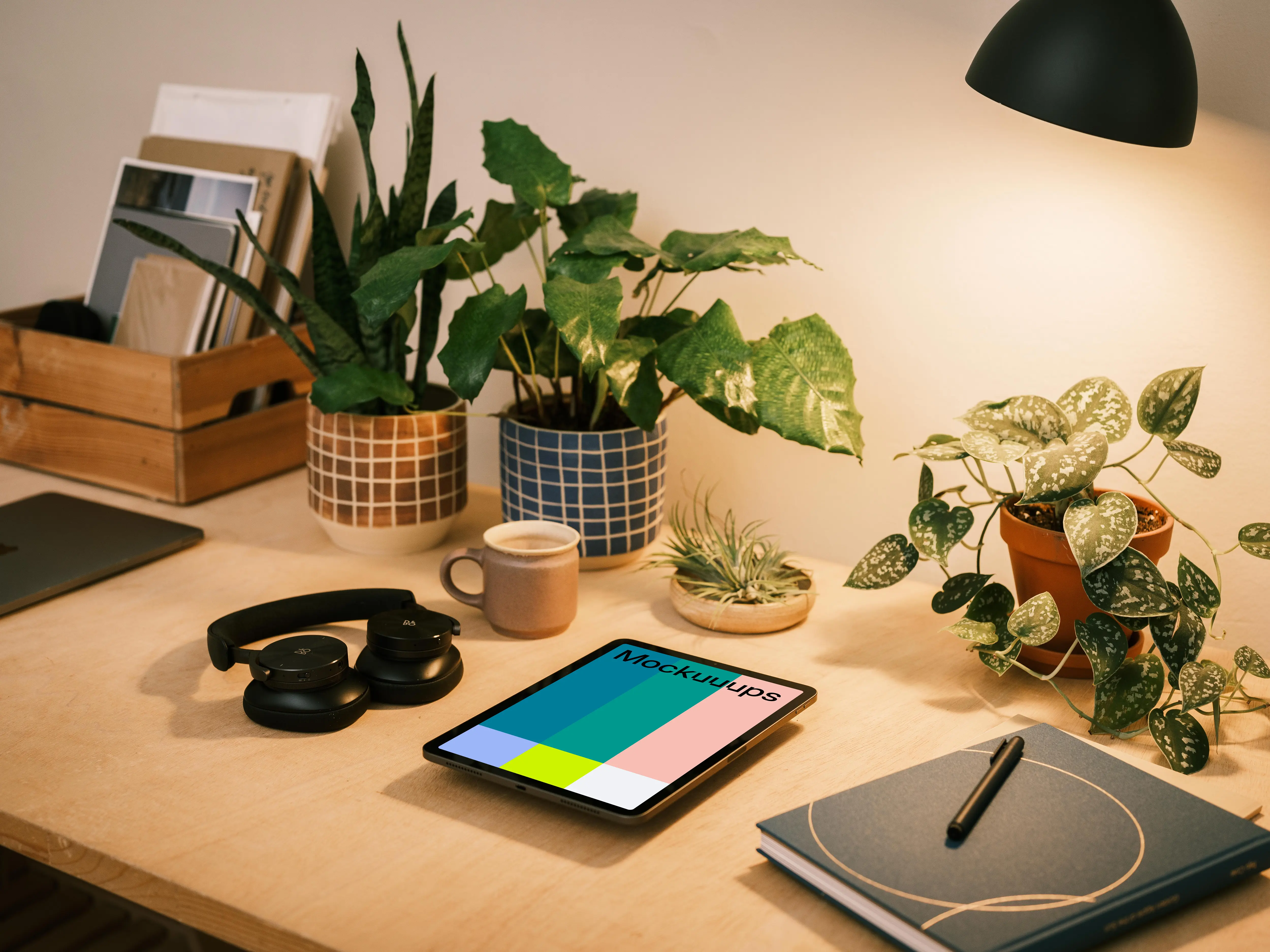 iPad Air mockup beside a black notepad