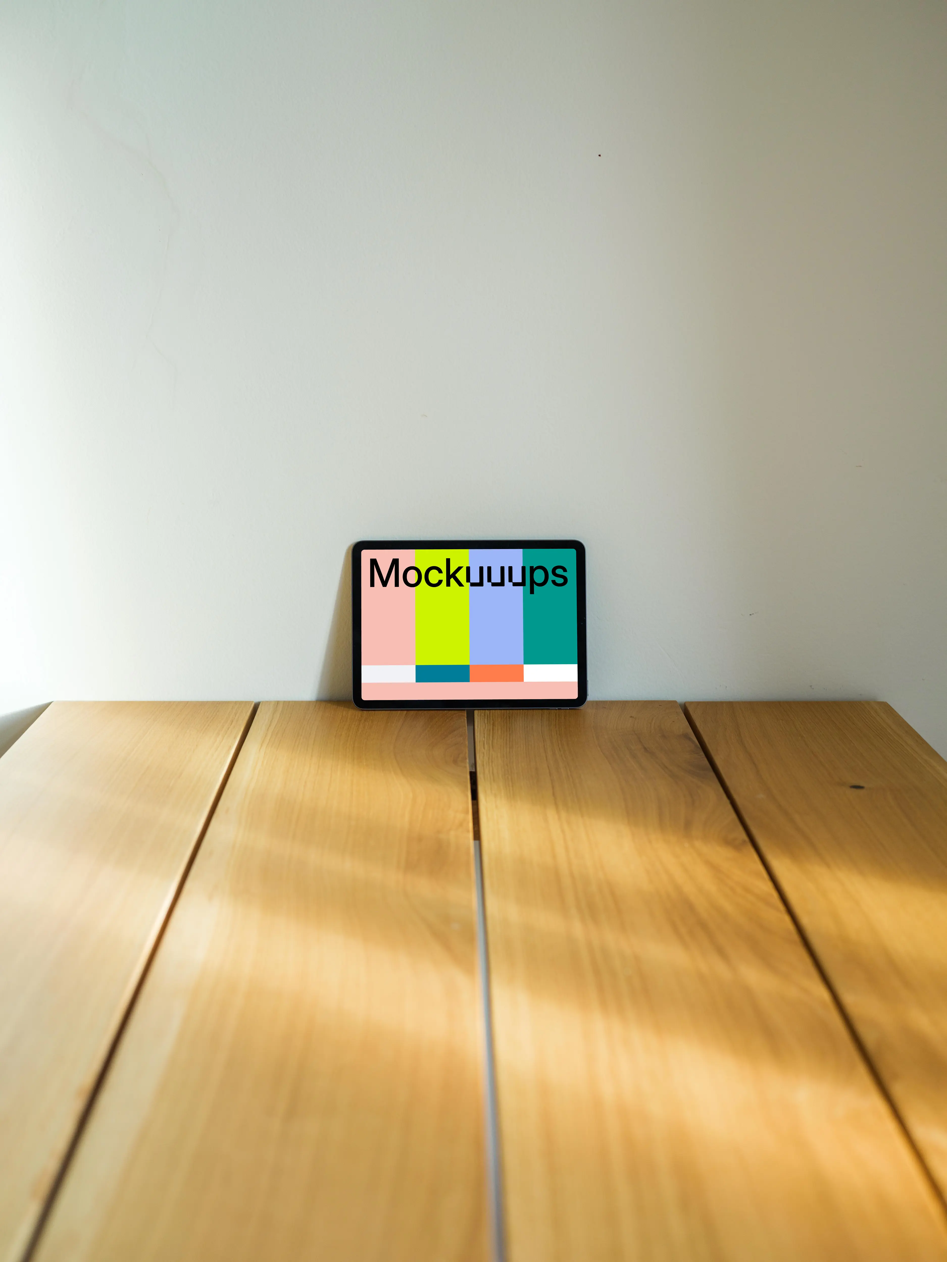 iPad Air mockup in landscape mode leaning on a wall