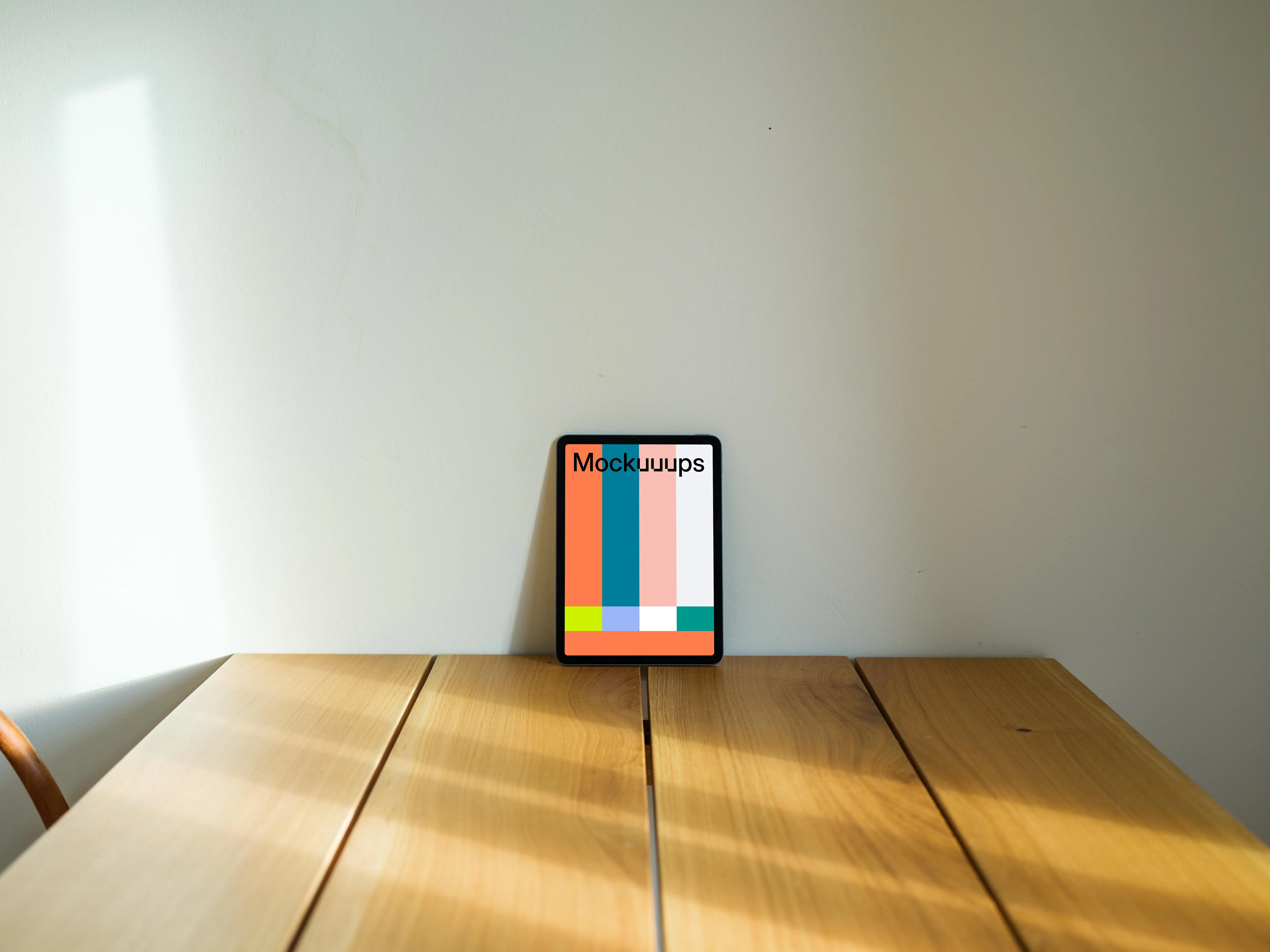 iPad Air mockup leaning on a wall