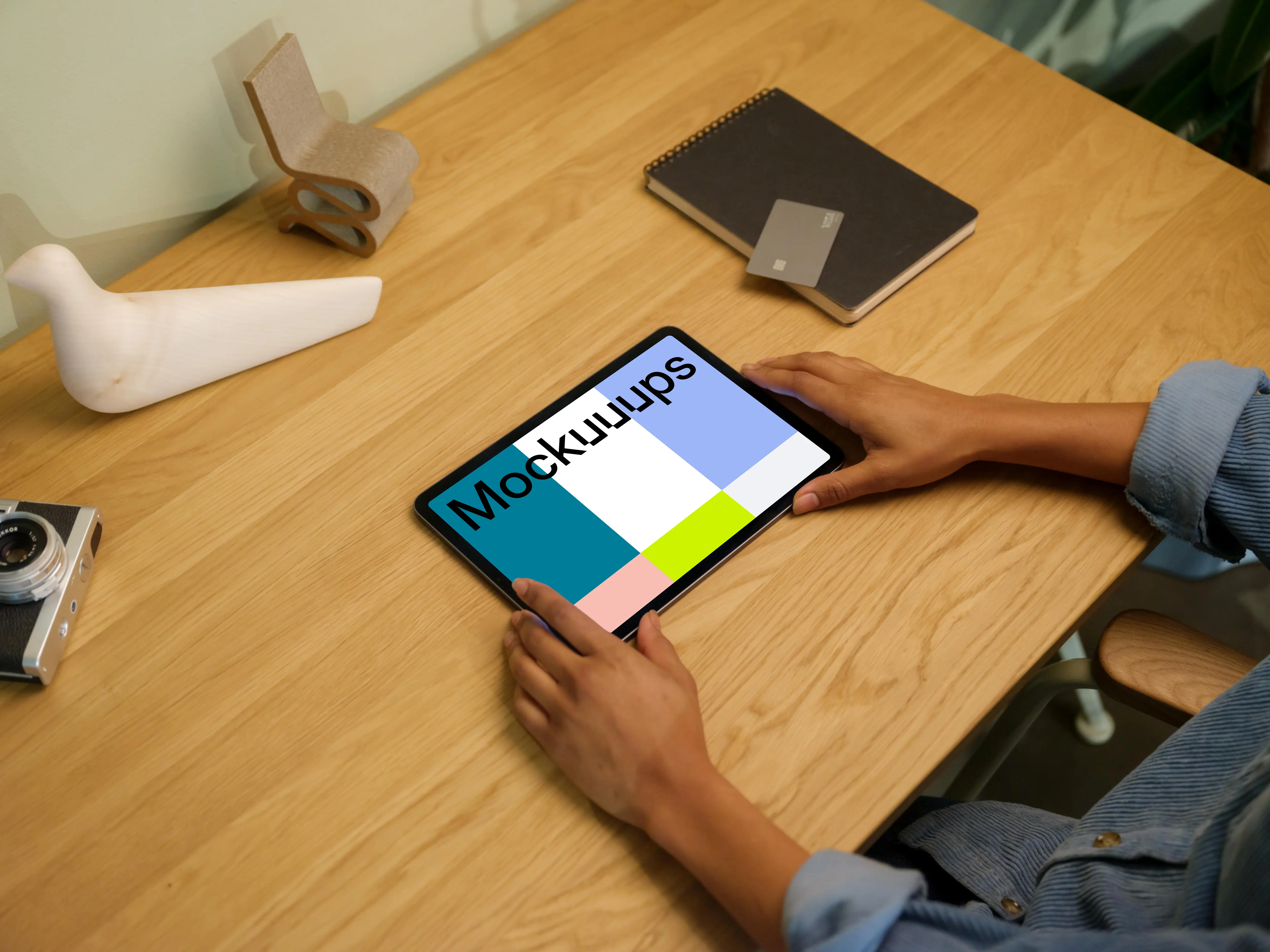 iPad Air mockup on wooden table with decorations