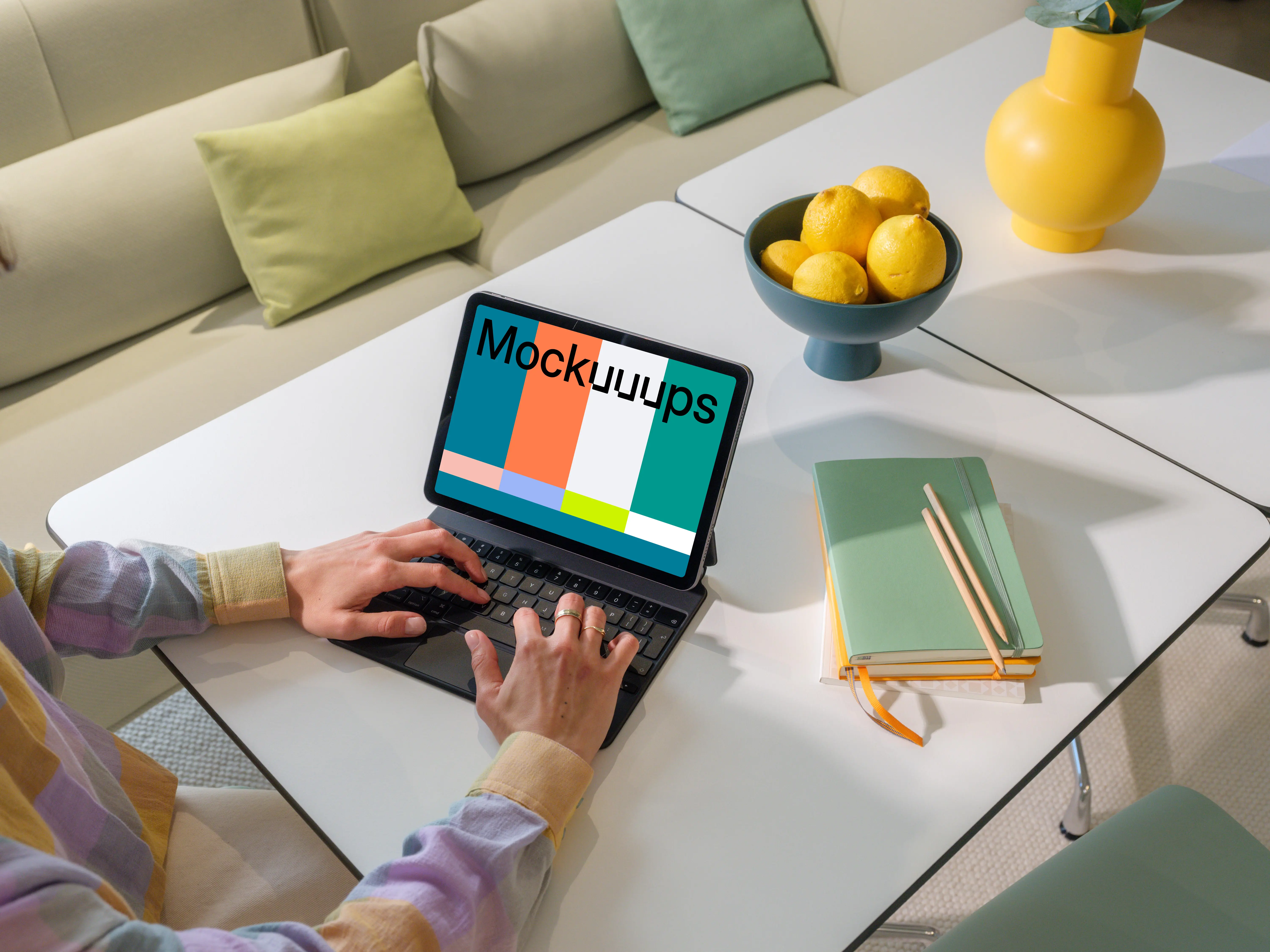 iPad Air mockup with woman's hands on home office desk