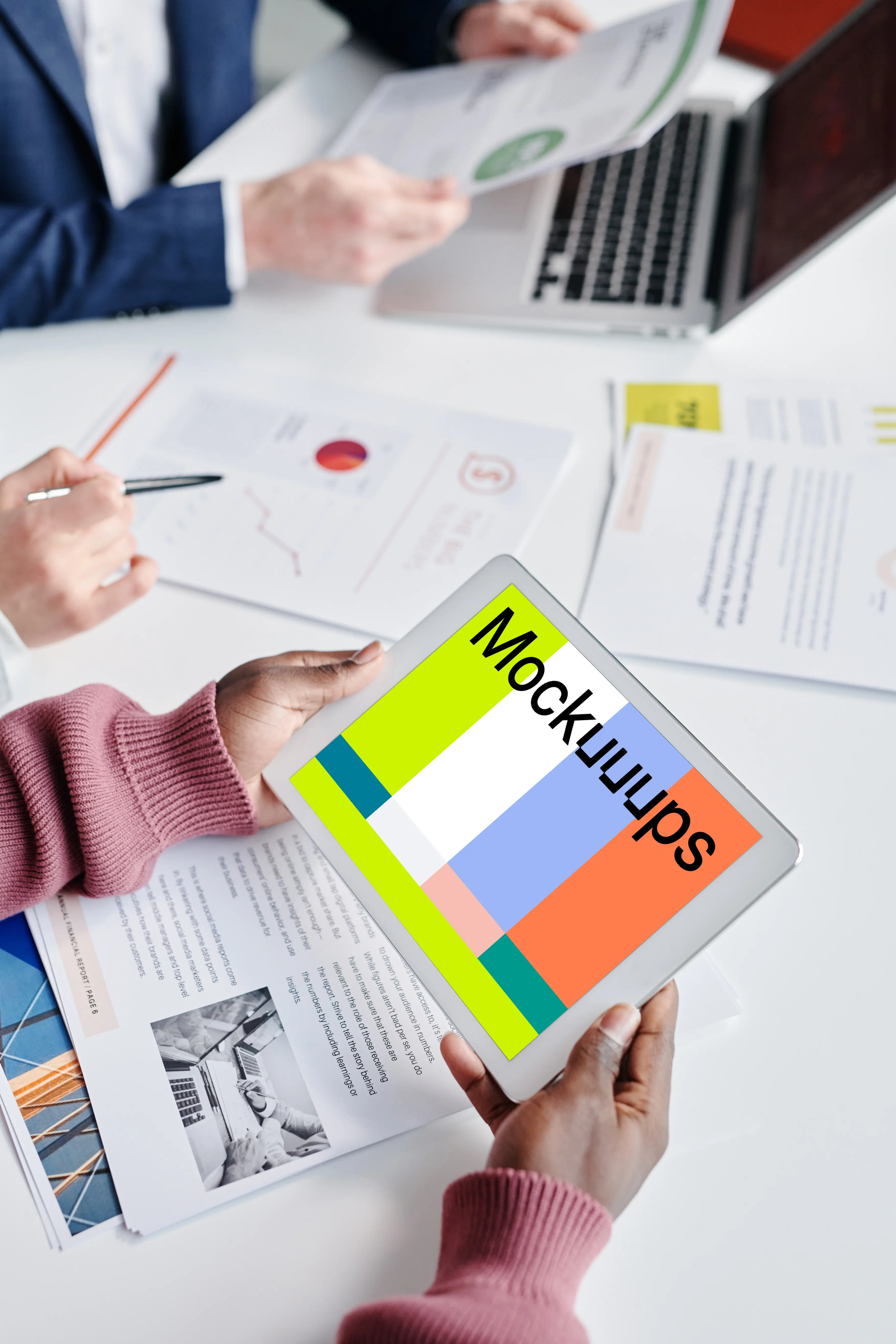 iPad Mini mockup held over a magazine