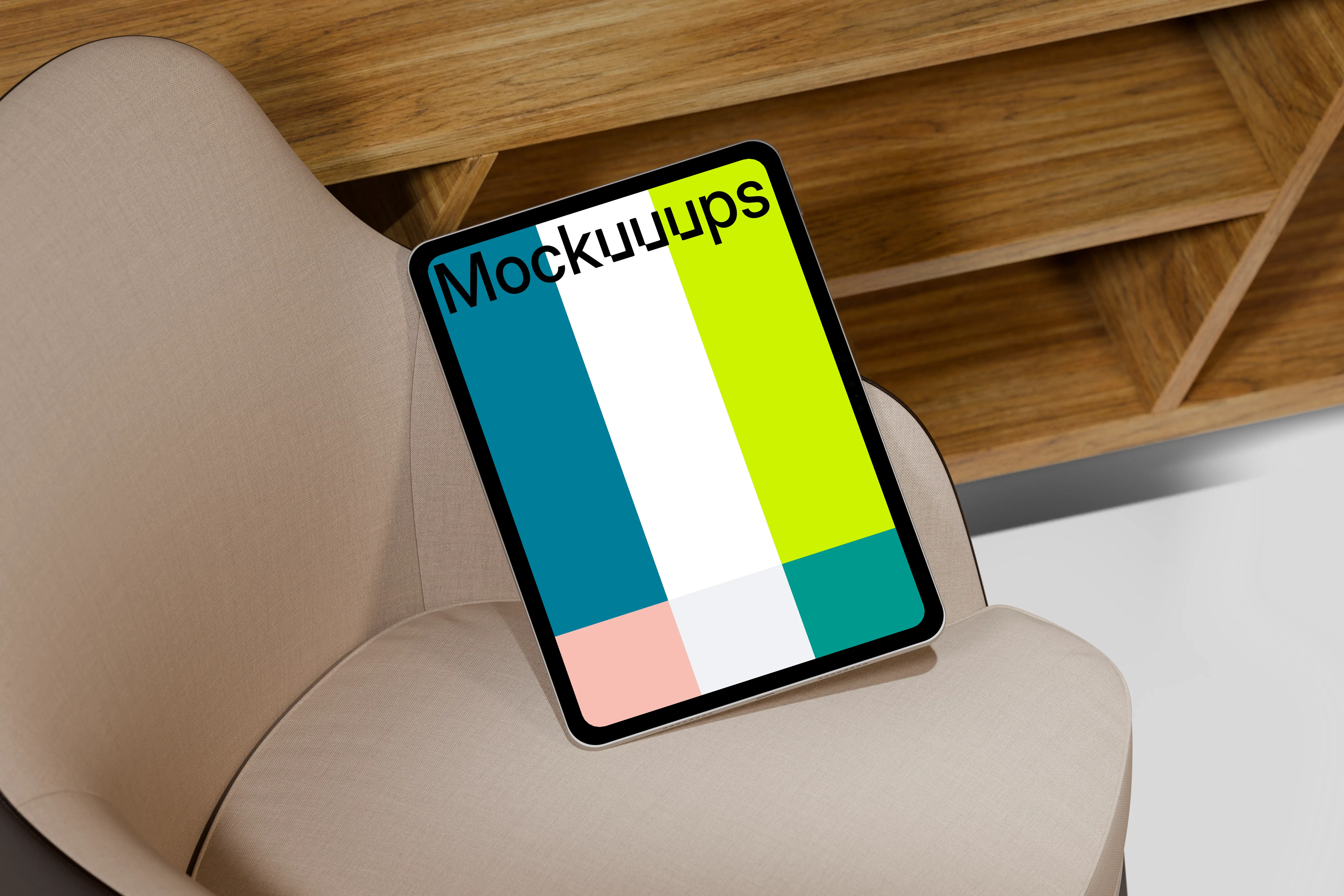 iPad Pro mockup on a modern beige chair