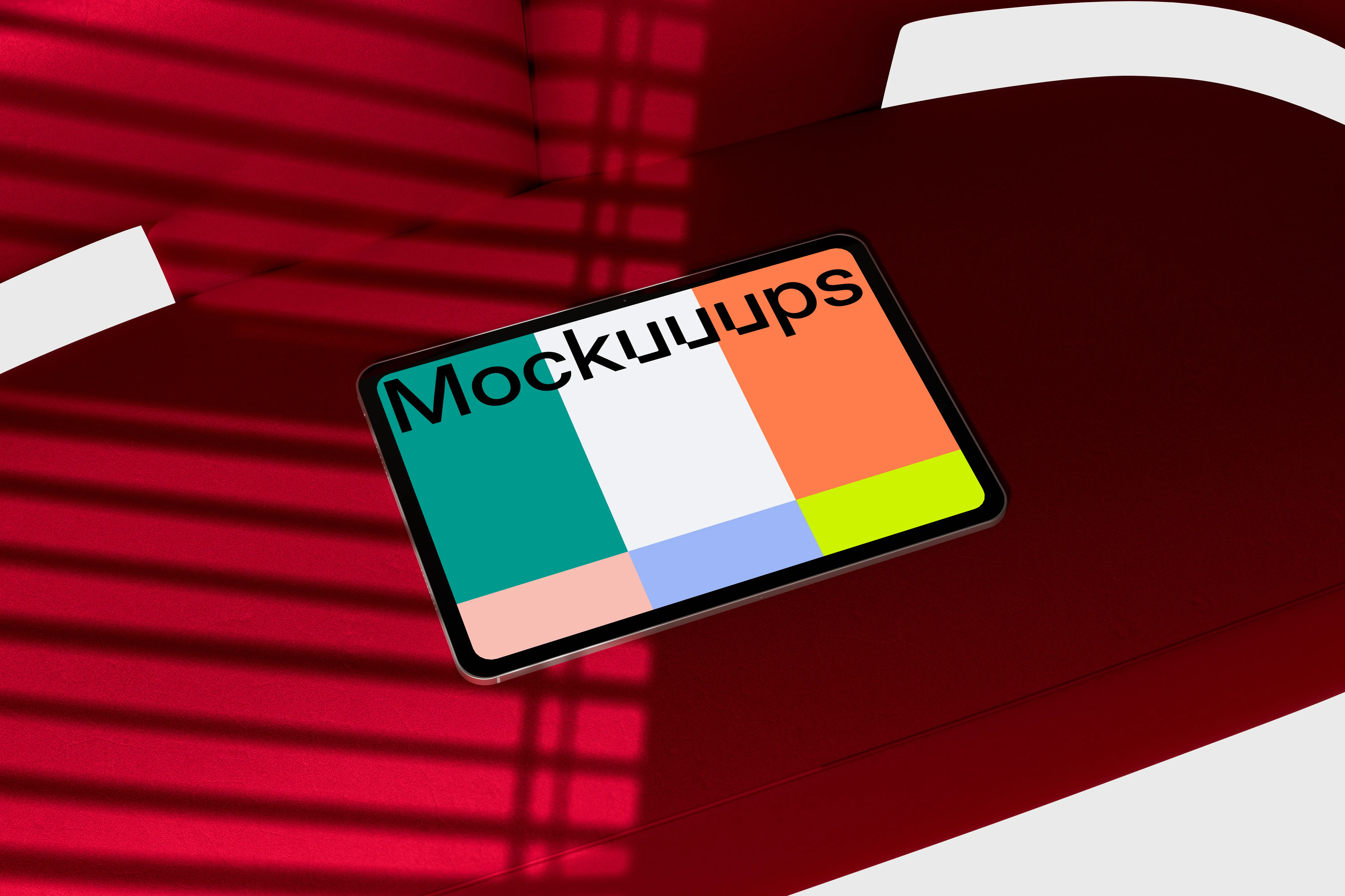 iPad Pro mockup on a red modern surface