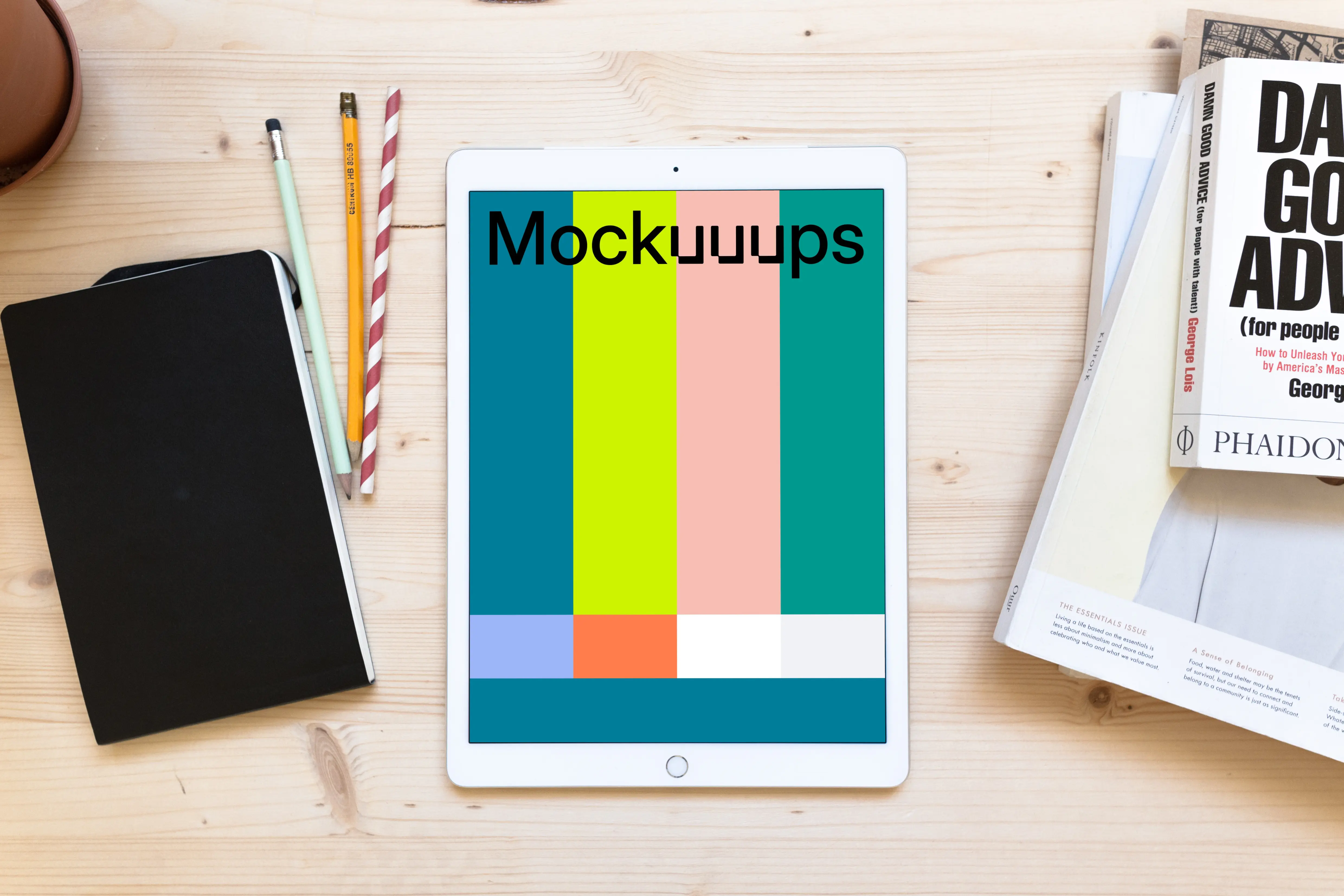 iPad Pro mockup on the wooden working desk