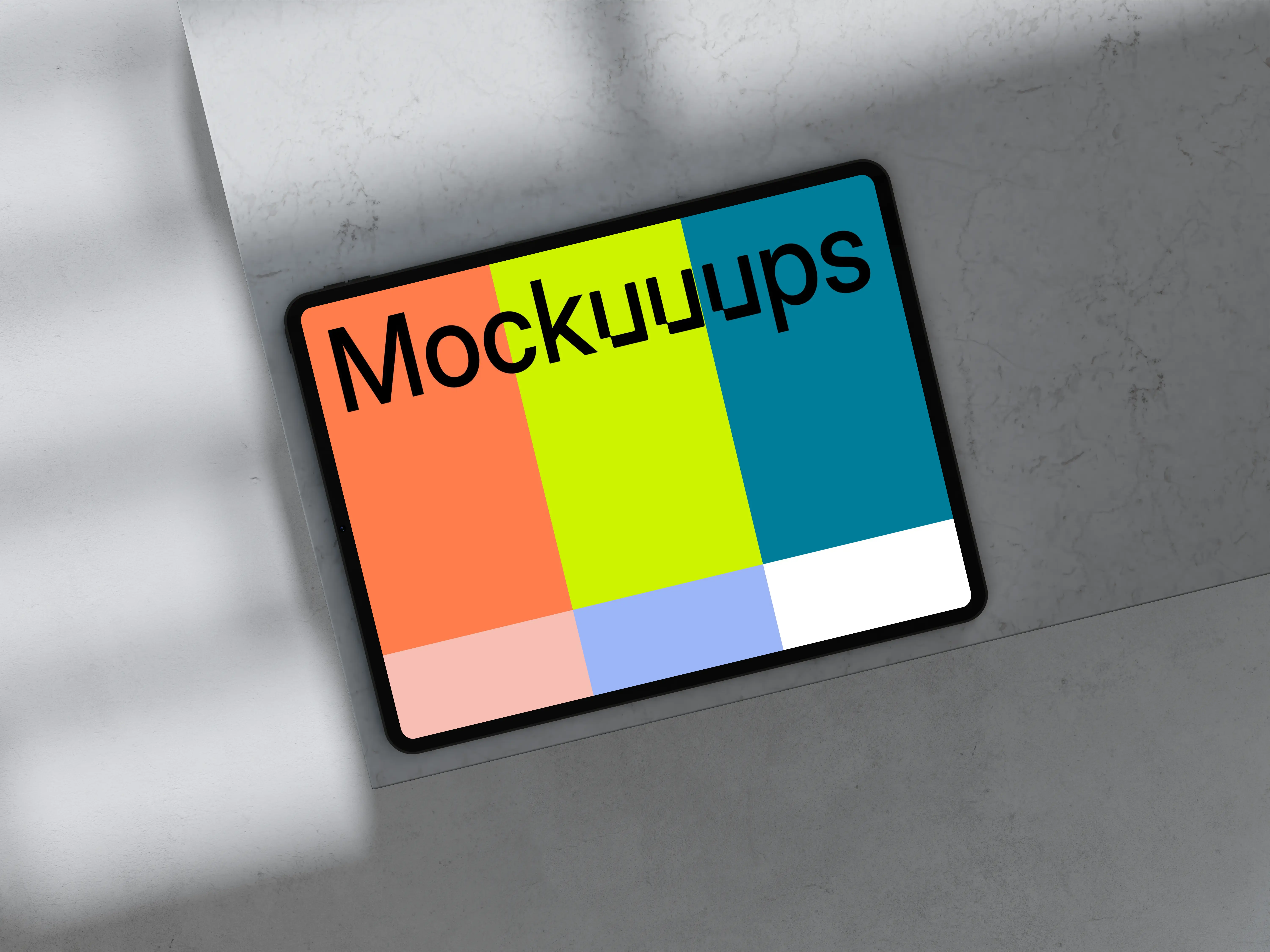 iPad Pro mockup placed on marble surface with shadows