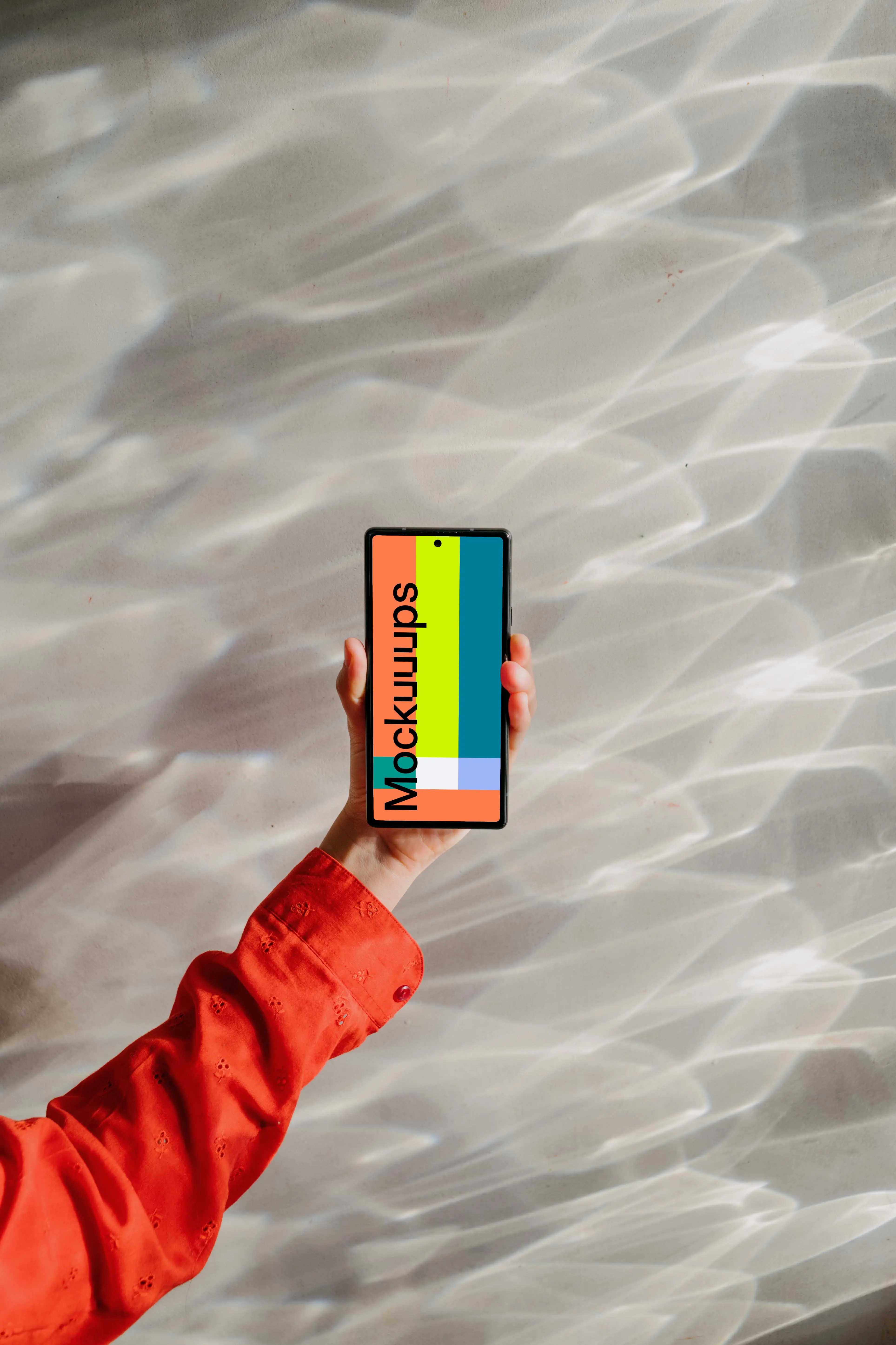 Google Pixel 6 mockup held by a user against a bright background