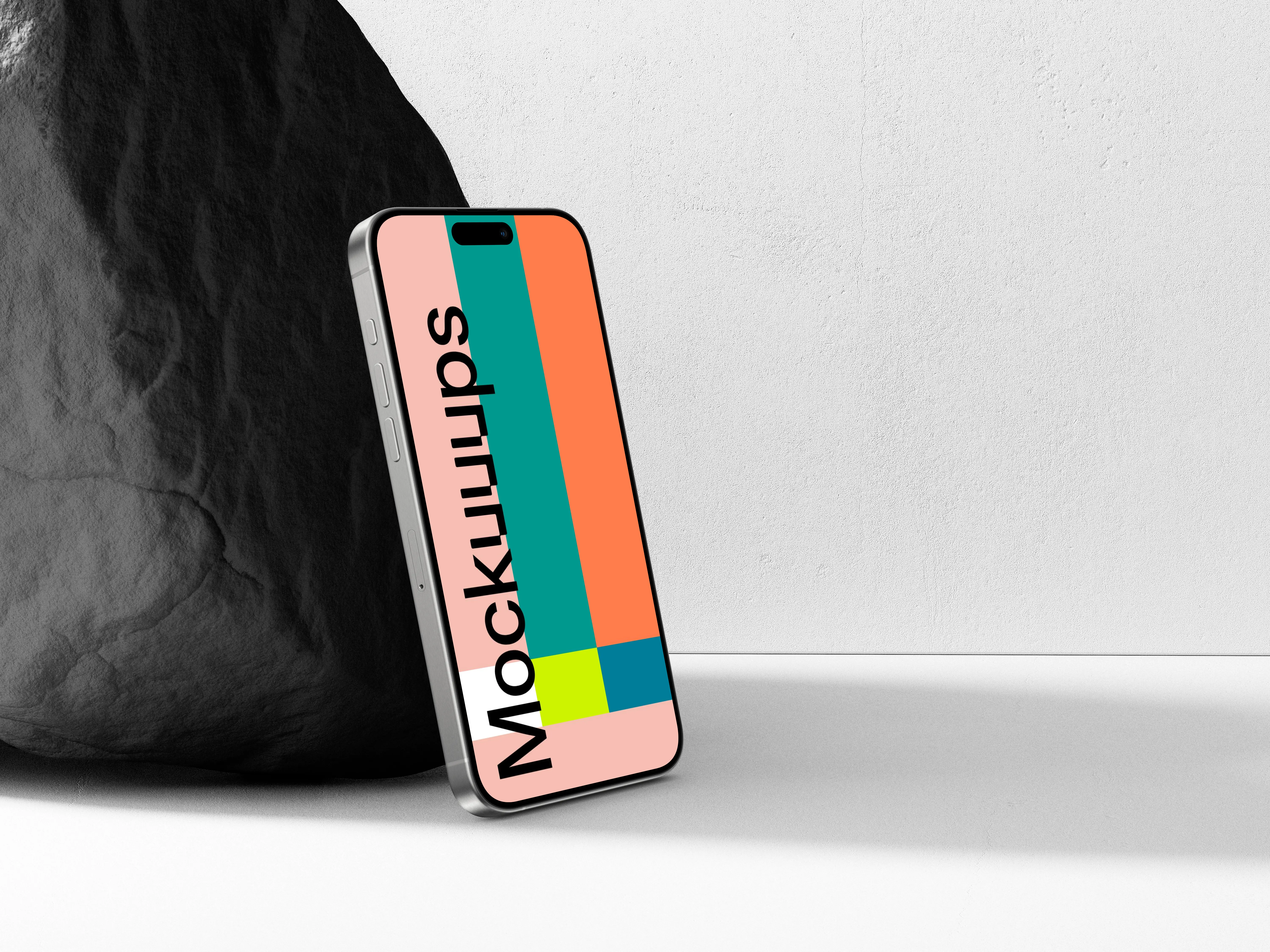 iPhone 15 Pro Leaning Against a Rock Mockup