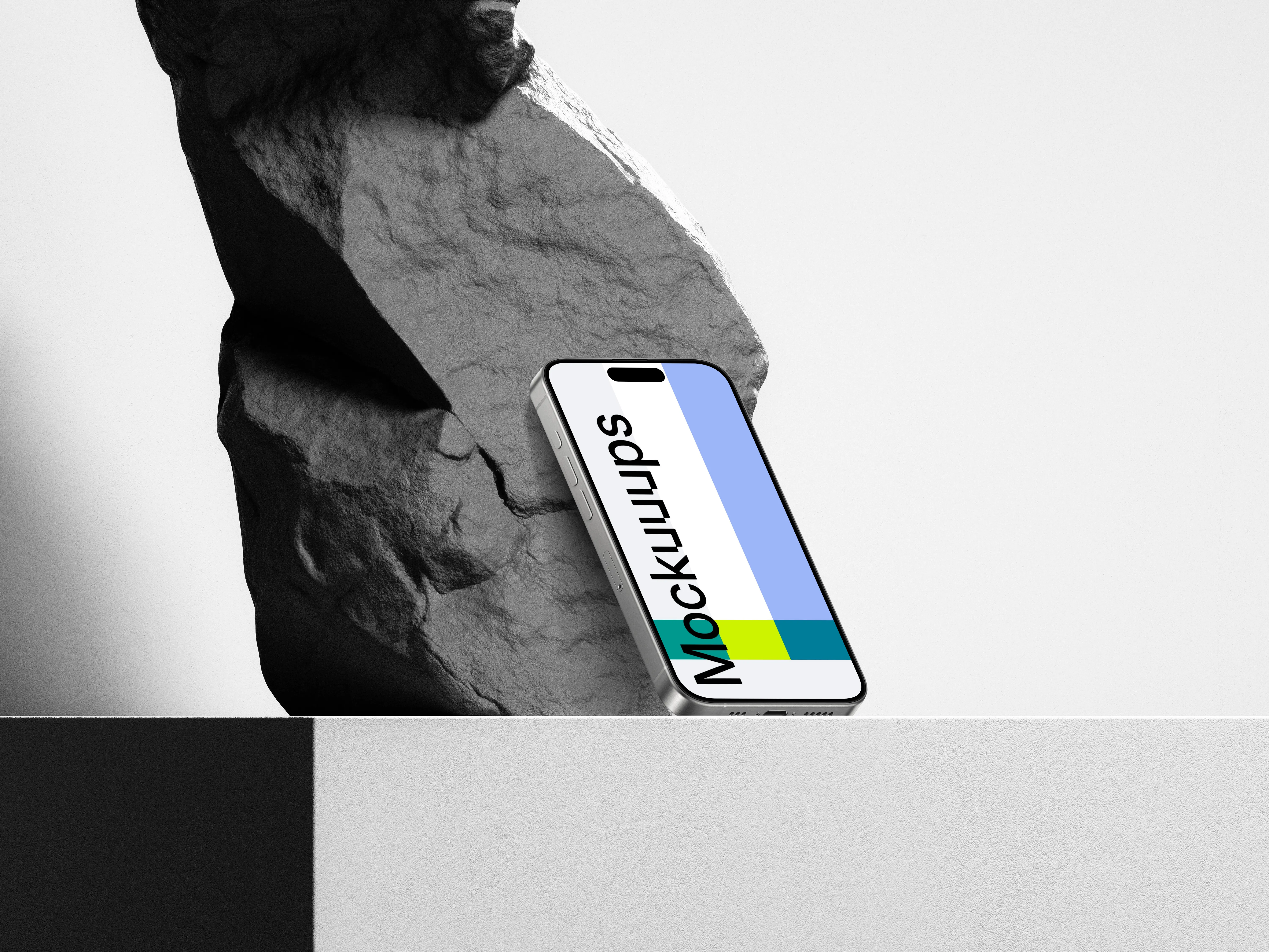 iPhone 15 Pro on Rock Mockup