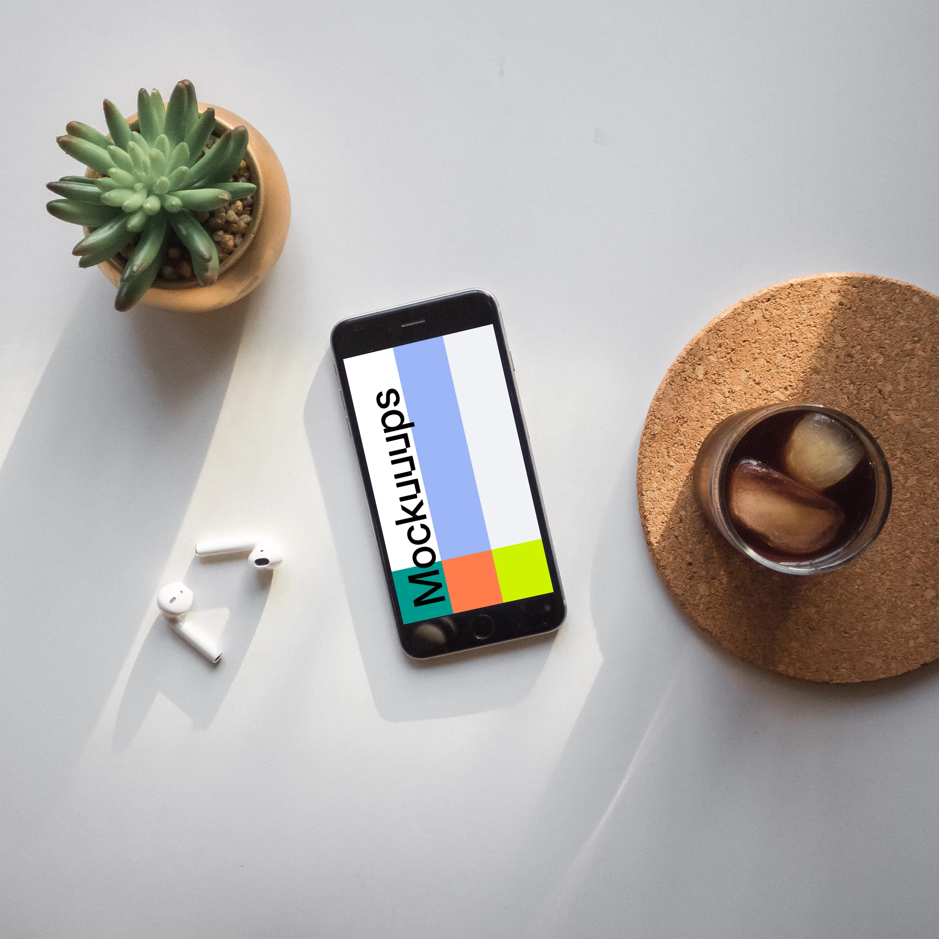 iPhone 6 Space Gray mockup on white table