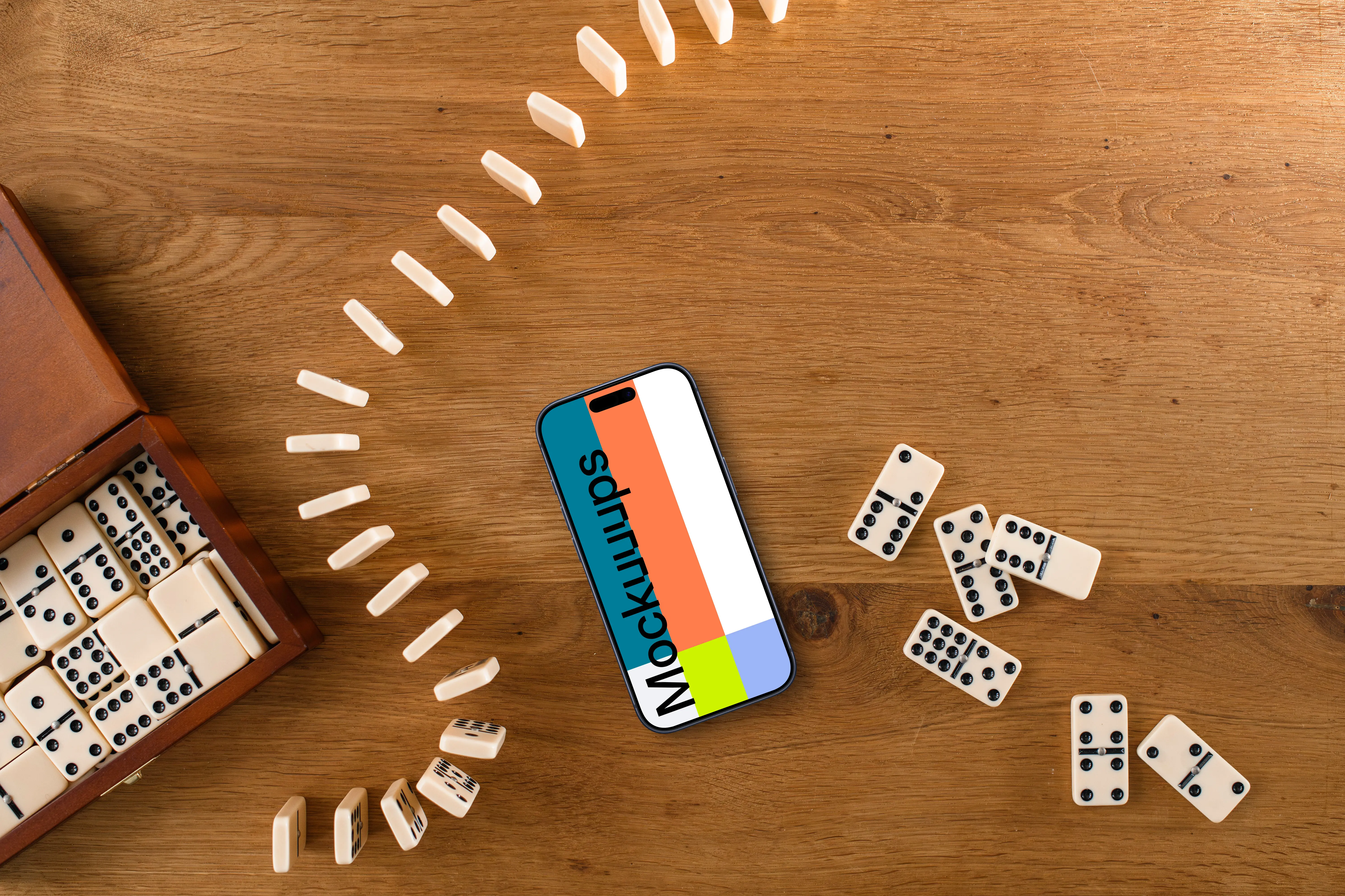 iPhone mockup in the middle of dominoes